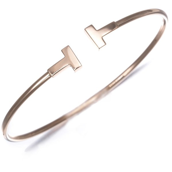 Tiffany&Co. Bracelet Tiffany T Wire Narrow Bangle 18K 750 Rose Gold: Tiffany&Co. Bracelet Tiffany T Wire Narrow Bangle 18K 750 Rose Gold Elevate your style with this exquisite 18k rose gold Tiffany & Co. bangle, crafted from the iconic Tiffany T Wire design. This elega