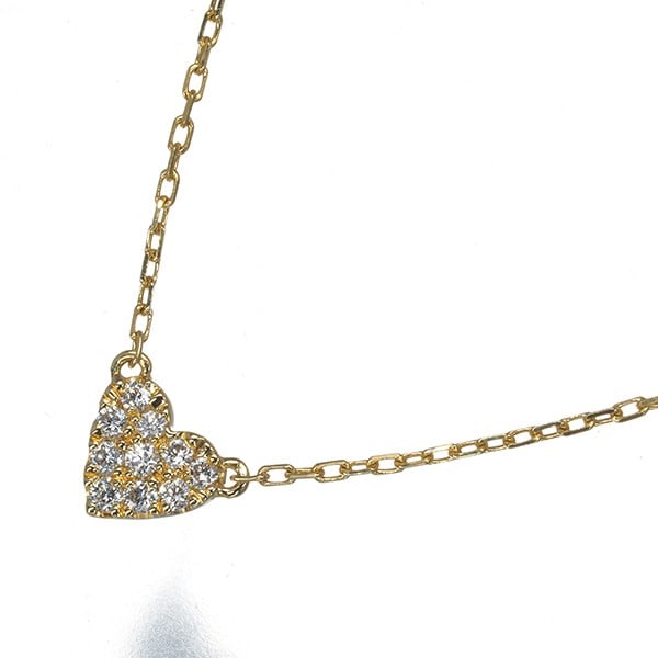 Yellow Gold 18K Heart Necklace with Diamond 0.05Ct Pave: Yellow Gold 18K Heart Necklace with Diamond 0.05Ct Pave Elevate your style with this exquisite 18k yellow gold heart necklace, featuring a delicate diamond pave design that adds subtle sparkle to its