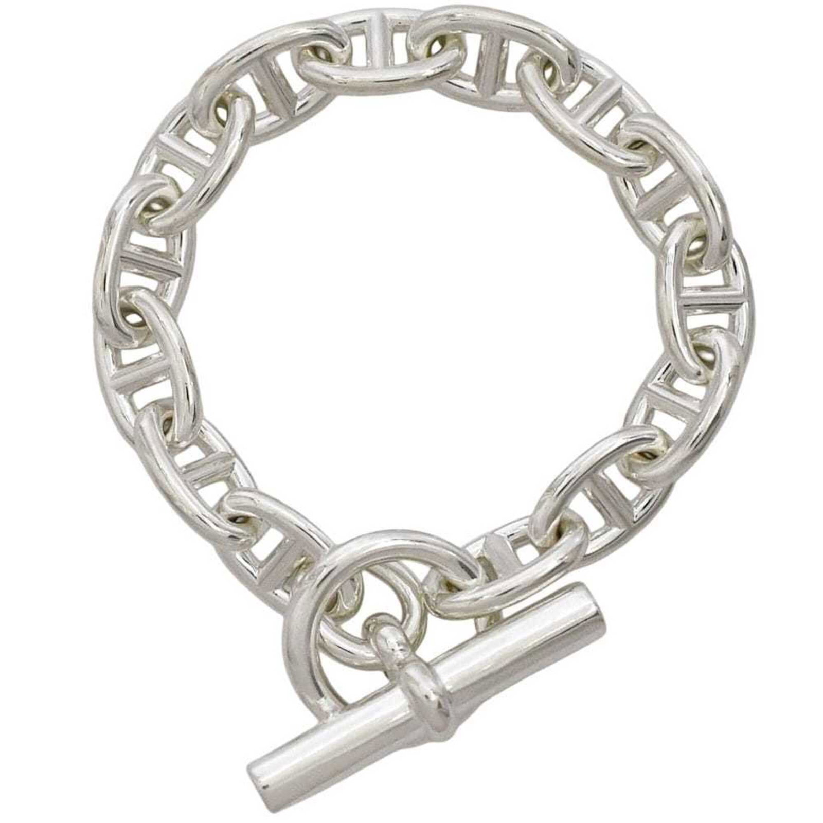 Hermes Charm Bracelet Silver 925: Hermes Charm Bracelet Silver 925 A delicate silver 925 charm bracelet from iconic French fashion house Hermes, featuring subtle traces of wear and minor scratches. This pre-owned piece boasts a timele