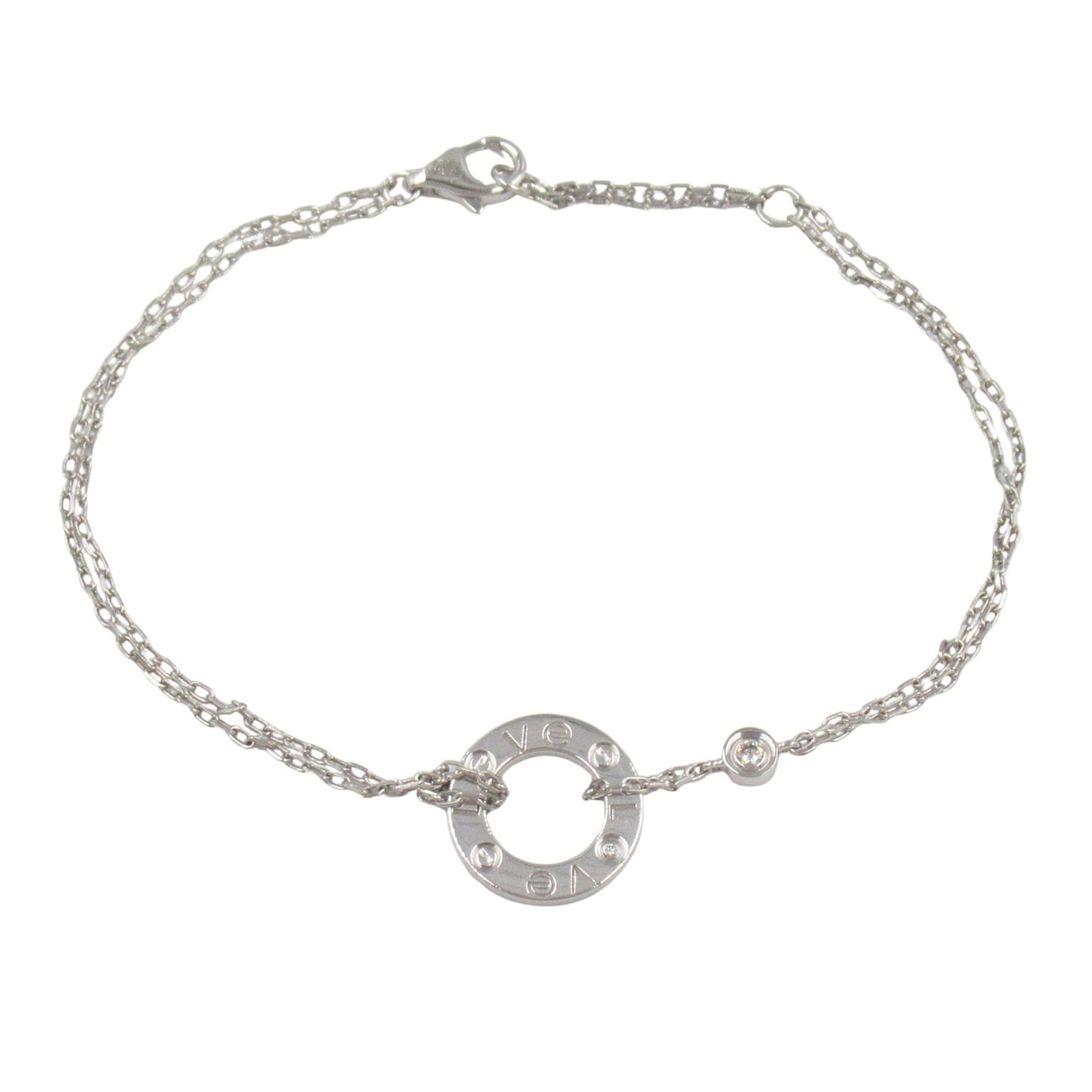 Cartier Charm White Gold 18K: Cartier Charm White Gold 18K A Cartier Charm bracelet in white gold 18K, featuring a clear diamond stone, is available for purchase. This pre-owned piece boasts a classic design and measures
