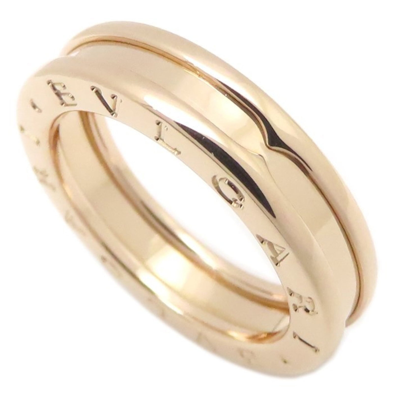Bvlgari pink gold band ring.: Bvlgari pink gold band ring. A delicate Bvlgari pink gold band ring, crafted from 18K pink gold, adds a touch of elegance to any outfit with its understated yet sophisticated design. With a US size