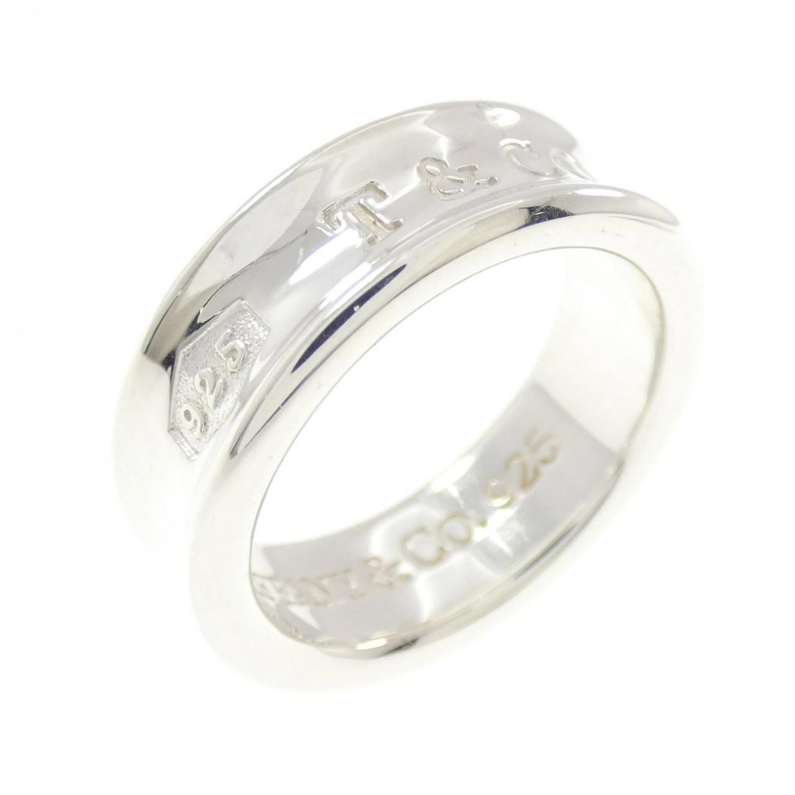 Tiffany silver ring band.: Tiffany silver ring band. A 925 sterling silver Tiffany ring band with a classic design, this piece is made from durable and long-lasting materials, offering a timeless touch to any outfit. With some