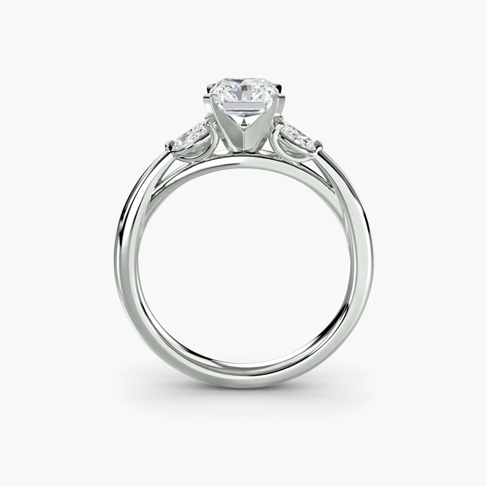 Side Stone Radiant 18Kt White Gold Ring Setting: Side Stone Radiant 18Kt White Gold Ring Setting Elevate your style with this stunning 18Kt White Gold Radiant Ring Setting, featuring four lab-grown side stones totaling 0.43 carats in EF/VS clarity a