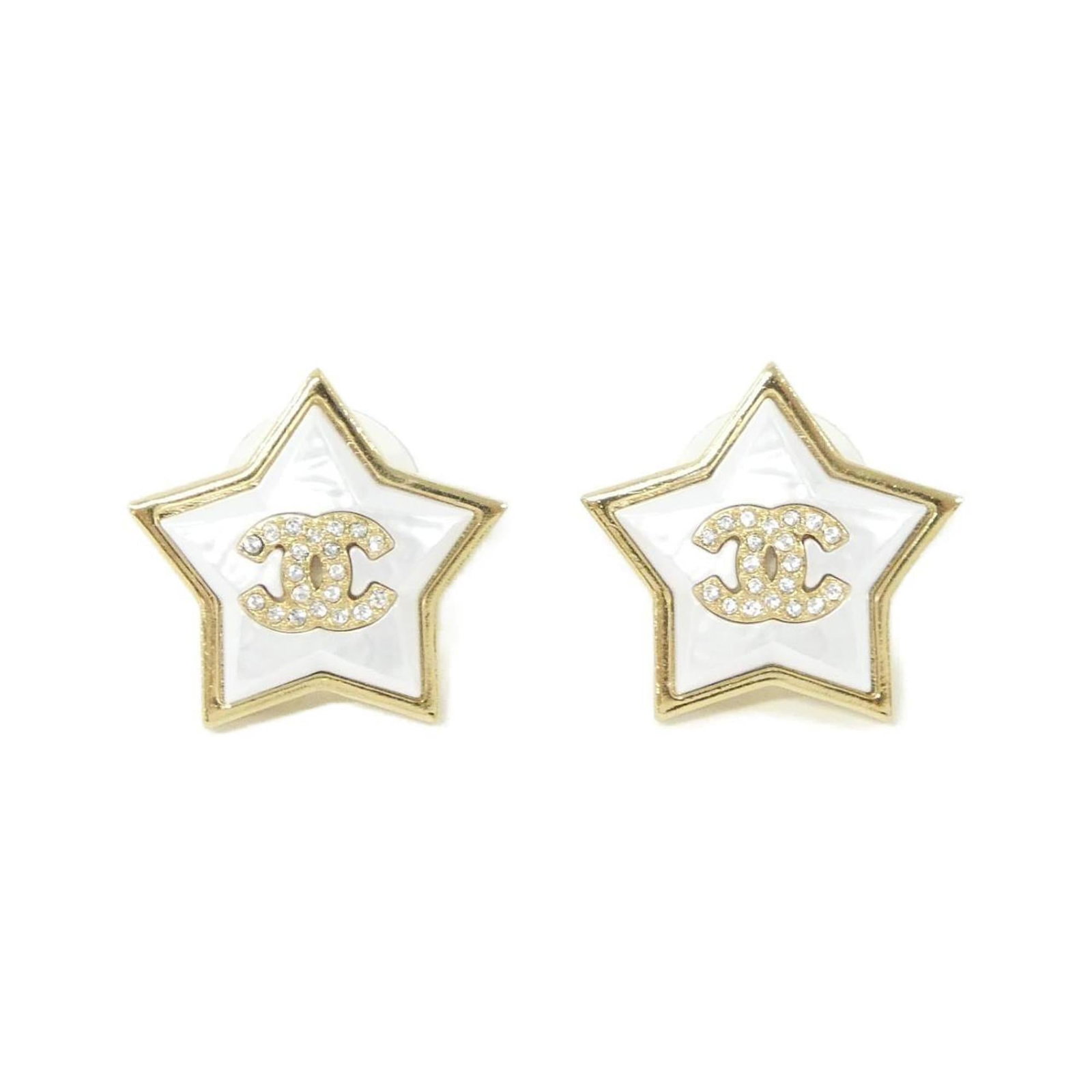 Chanel Stud Earrings: Chanel Stud Earrings Elegant and sophisticated, these Chanel stud earrings feature crystal stones set in gold for a touch of luxury. With their classic design and high-quality materials, they add a ti