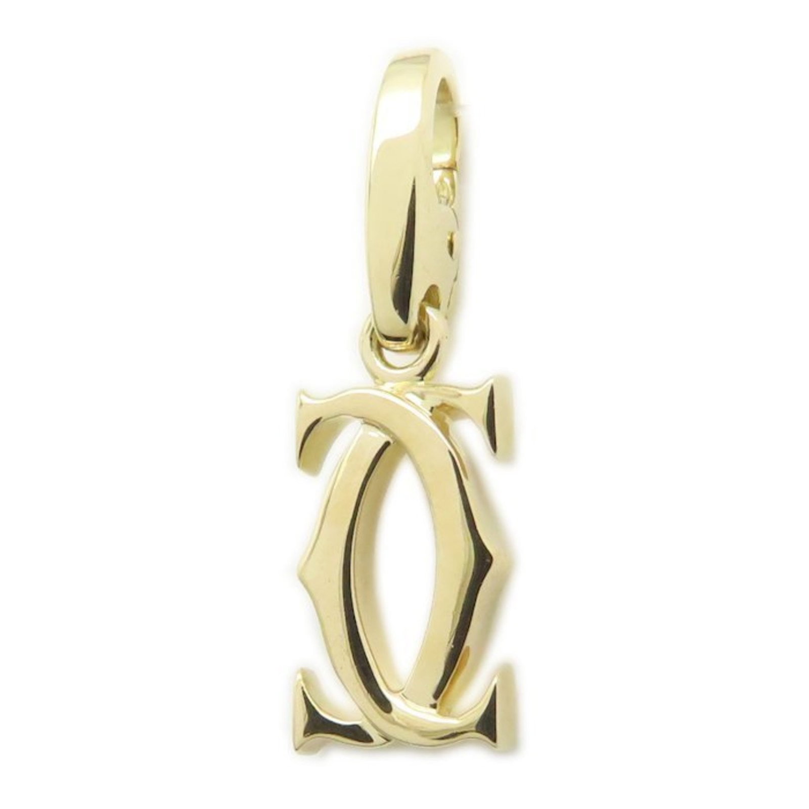 Women's 18K yellow gold top charm pendant from Cartier.: Women's 18K yellow gold top charm pendant from Cartier. A stunning 18K yellow gold top charm pendant from renowned luxury brand Cartier, this delicate piece boasts intricate details and timeless elega