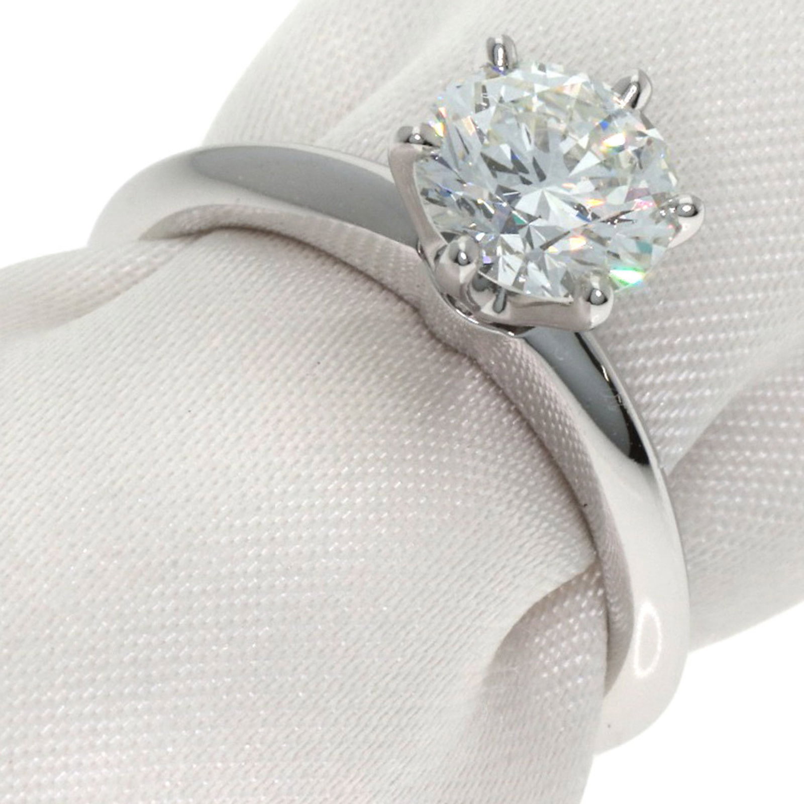 Tiffany and Co platinum solitaire diamond ring for women. (1 of 7)
