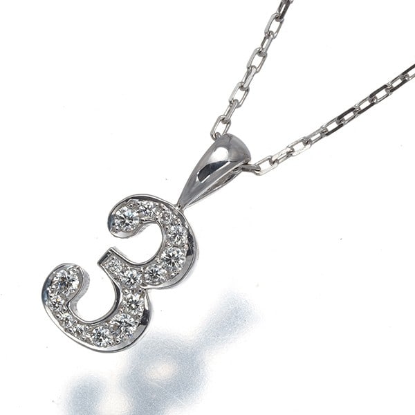 Eyefunny Necklace Diamond Number No.3 18K 750 White Gold: Eyefunny Necklace Diamond Number No.3 18K 750 White Gold A stunning 18k white gold diamond pendant, this Eyefunny Necklace showcases a natural diamond at its center, crafted in Japan with attention