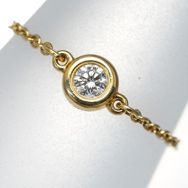 Tiffany&Co. Ring Diamonds By The Yard Diamond Chain Us4-4.25 18K Yg: Tiffany&Co. Ring Diamonds By The Yard Diamond Chain Us4-4.25 18K Yg A stunning 18k yellow gold ring featuring natural diamonds from Tiffany&Co.'s By The Yard collection, crafted to perfection with a