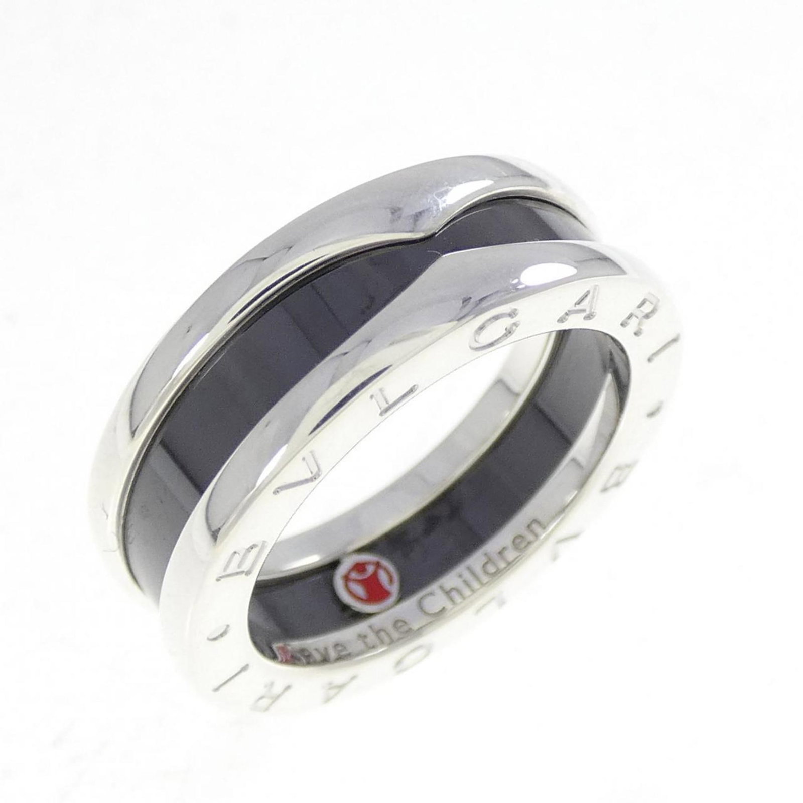 Bvlgari Band Ring Ceramic, Silver 925: Bvlgari Band Ring Ceramic, Silver 925 A Bvlgari Band Ring in silver 925, crafted from durable ceramic and sterling silver, adds a touch of luxury to any wrist. With its sleek design and subtle