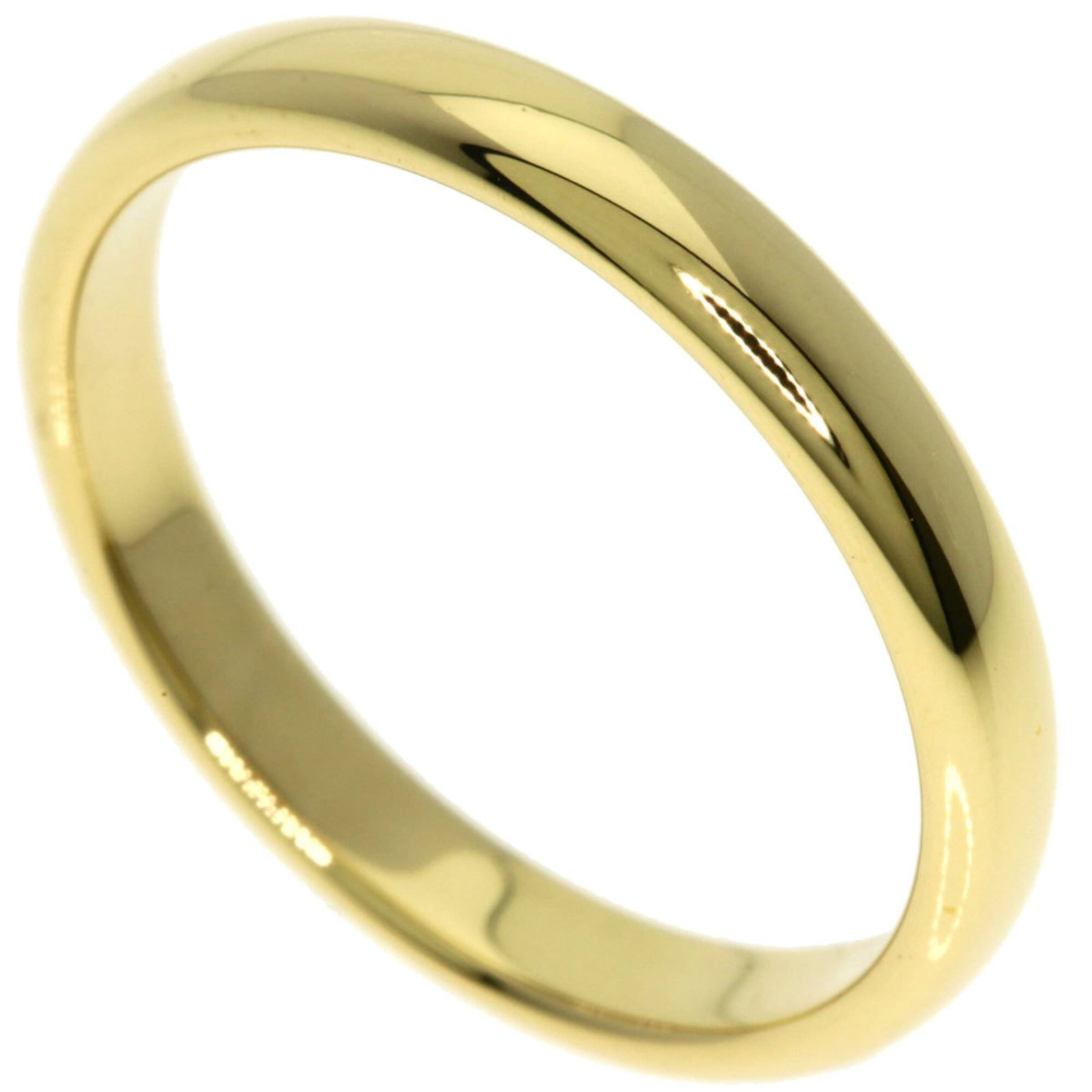 Tiffany 18k yellow gold band ring: Tiffany 18k yellow gold band ring A beautiful 18k yellow gold band ring from Tiffany, crafted with attention to detail and timeless elegance. This used ring boasts a classic design, showcasing the sub