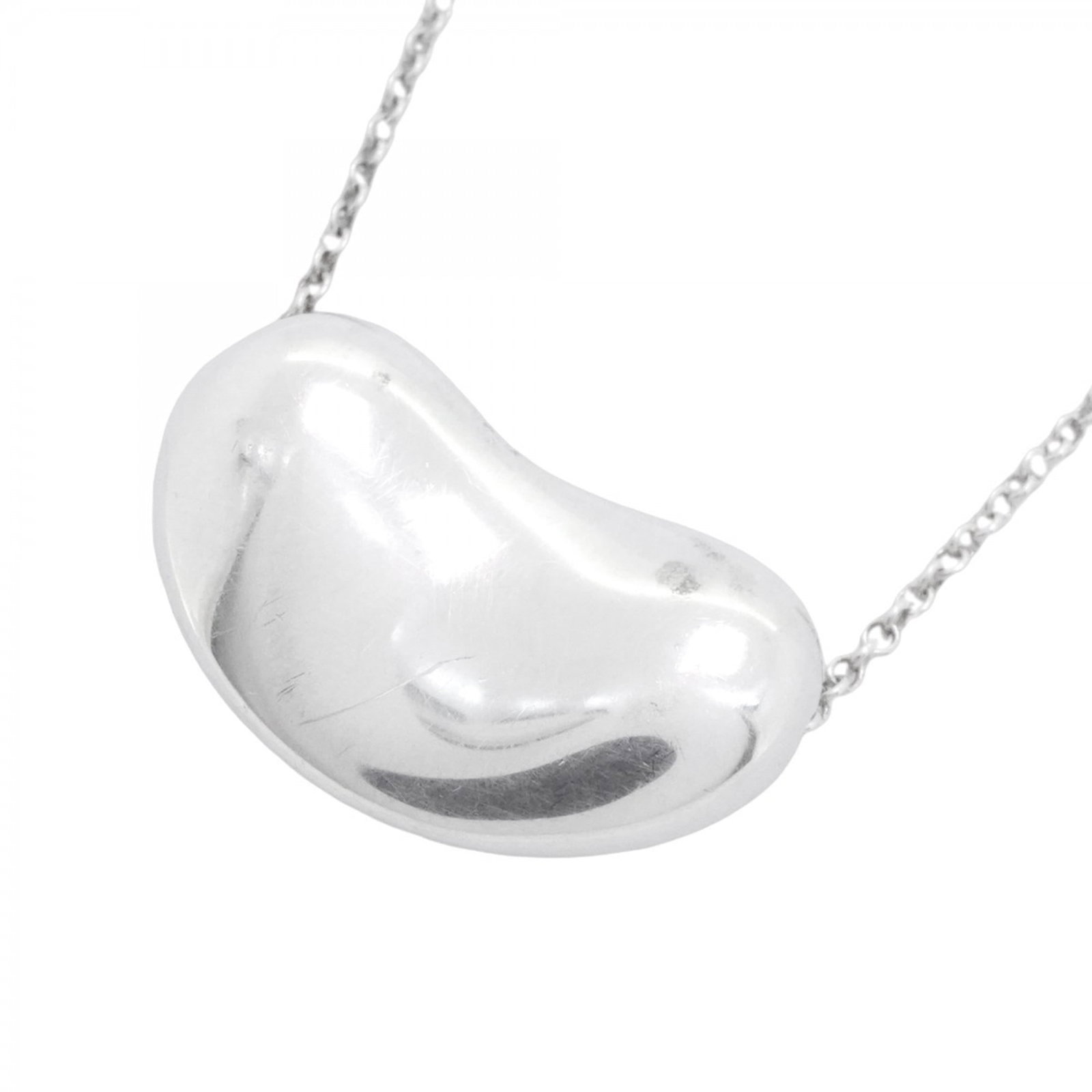 Tiffany & Co. Bean Necklace, Sterling Silver 925, Women's: Tiffany & Co. Bean Necklace, Sterling Silver 925, Women's A stunning sterling silver 925 Tiffany & Co. Bean Necklace in excellent condition, with subtle traces of usage and minor scratches. The