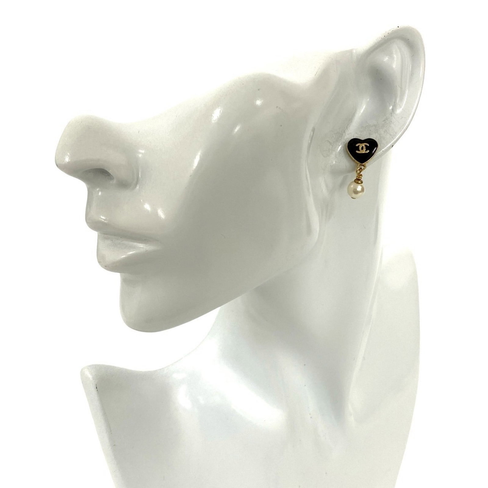 Chanel Stud Earrings Gold Plating: Chanel Stud Earrings Gold Plating Elevate your everyday look with these authentic Chanel stud earrings in gold plating. Featuring the iconic brand's signature style, these earrings showcase black and