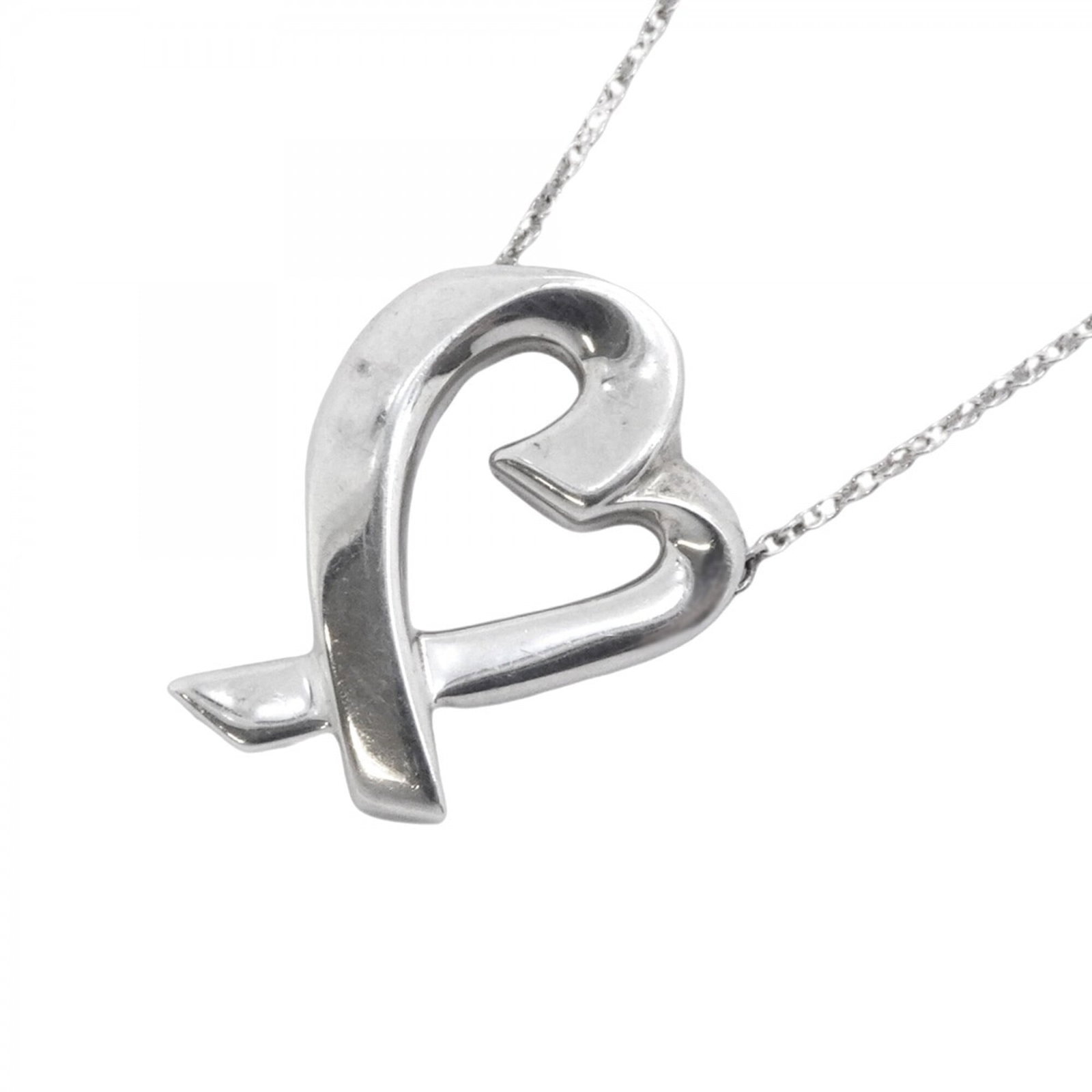 Tiffany and Co sterling silver loving heart necklace for women: Tiffany and Co sterling silver loving heart necklace for women A beautiful sterling silver loving heart necklace from Tiffany & Co., featuring a 21.4mm x 16.1mm pendant with a 48cm chain