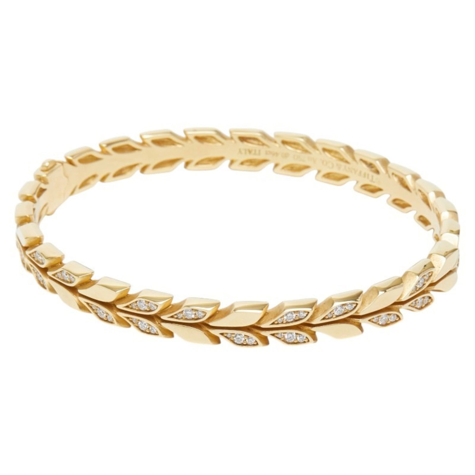 Tiffany Bangle Yellow Gold (18K): Tiffany Bangle Yellow Gold (18K) A beautiful 18K yellow gold bangle from Tiffany, crafted with attention to detail and timeless elegance. This lovely piece boasts a classic design that complements any