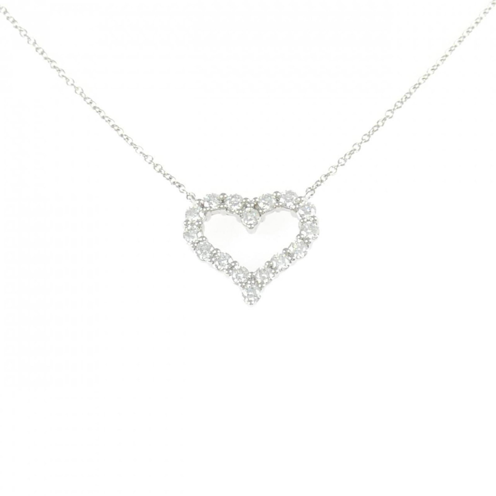 Tiffany & Co. is a small sentimental necklace.: Tiffany & Co. is a small sentimental necklace. A delicate Tiffany & Co. platinum necklace boasts a striking diamond pendant, set against a 42 cm chain with a pendant size of 13.5mm x 15.6mm. This used