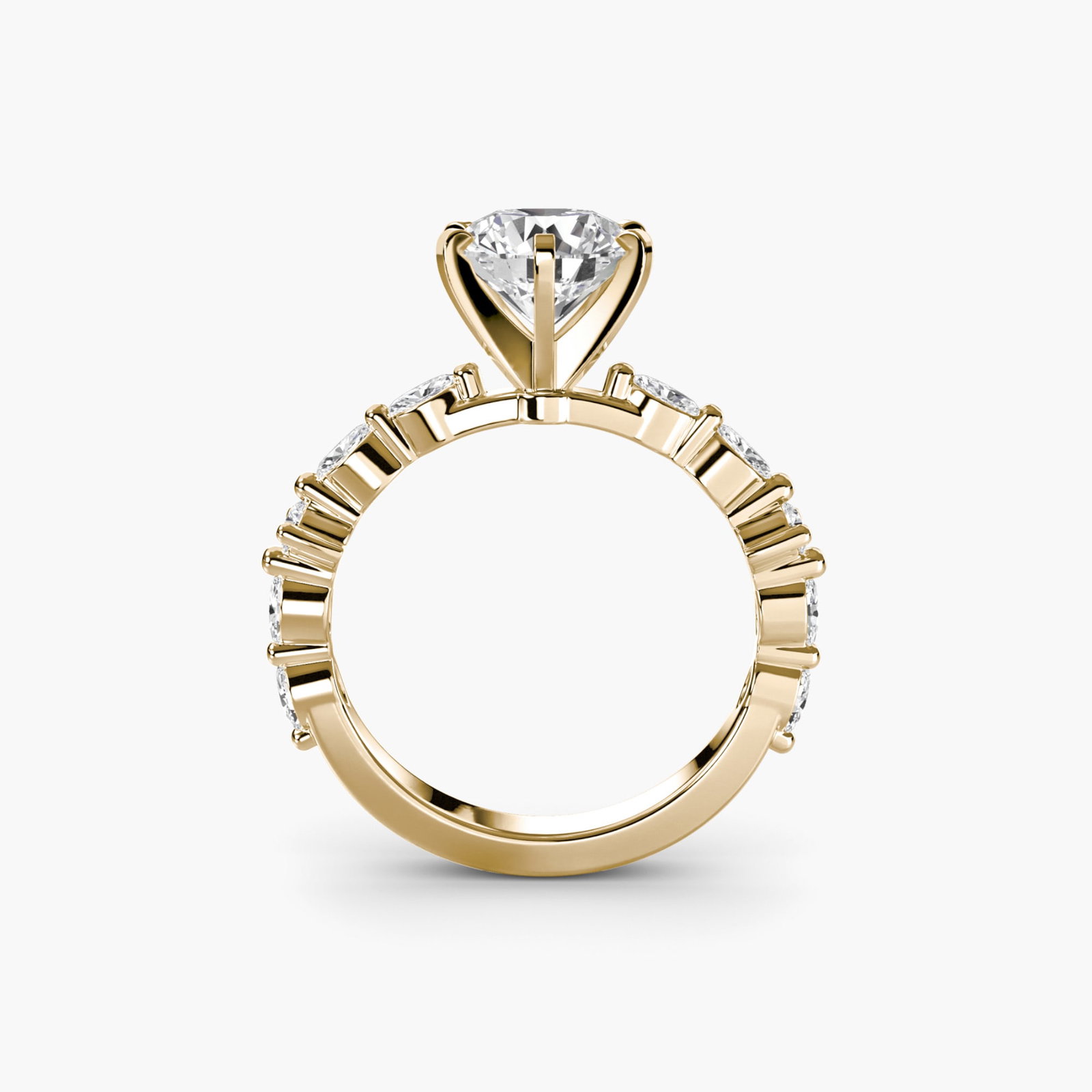 Pave Round 18Kt Yellow Gold Ring Setting: Pave Round 18Kt Yellow Gold Ring Setting Elegant and understated, this pave round 18Kt yellow gold ring setting boasts a subtle yet sophisticated design. With 10 side stones totaling 0.32 carats, its