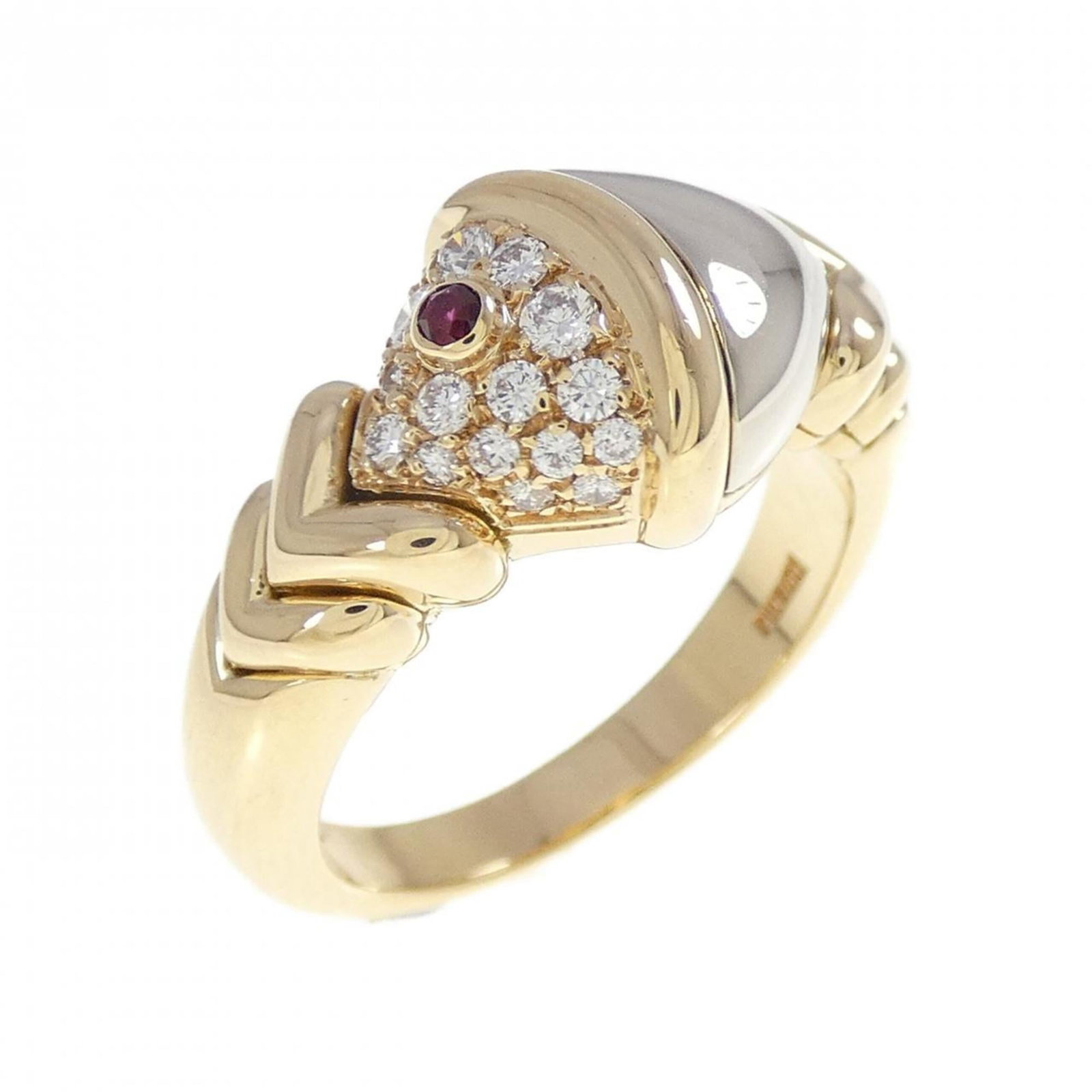 Bvlgari ruby ring.: Bvlgari ruby ring. A stunning Bvlgari ruby ring in 18K white gold and yellow gold, featuring a vibrant yellow gemstone set against a refined metal backdrop. With its unique blend of luxury materials