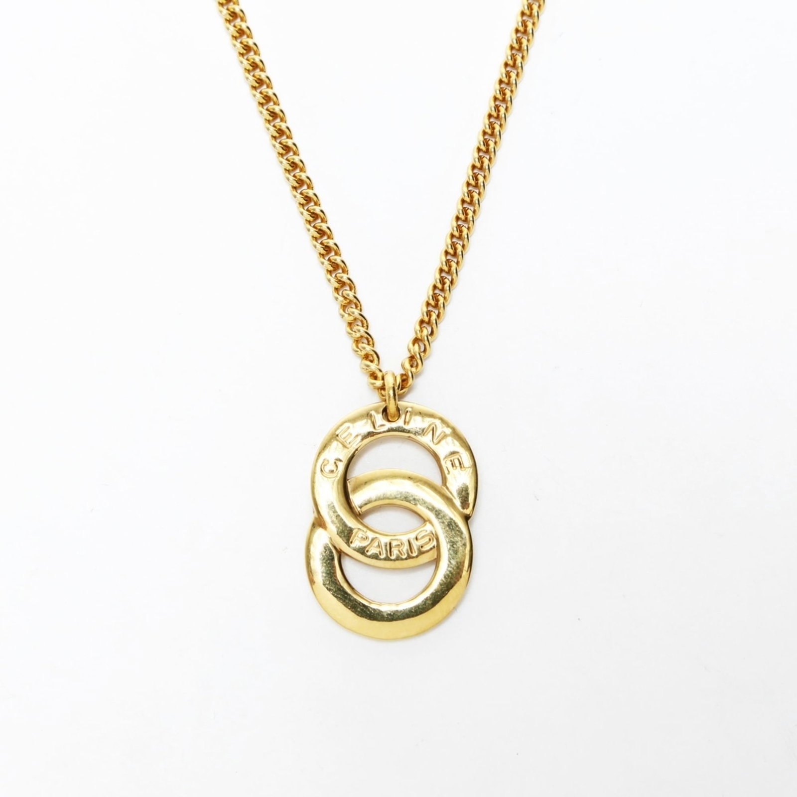 Gold celine necklace WS25517: Gold celine necklace WS25517 A luxurious gold Celine necklace adds a touch of elegance to any outfit with its 30mm x 21mm pendant and adjustable 42cm chain, perfect for dressing up or adding a