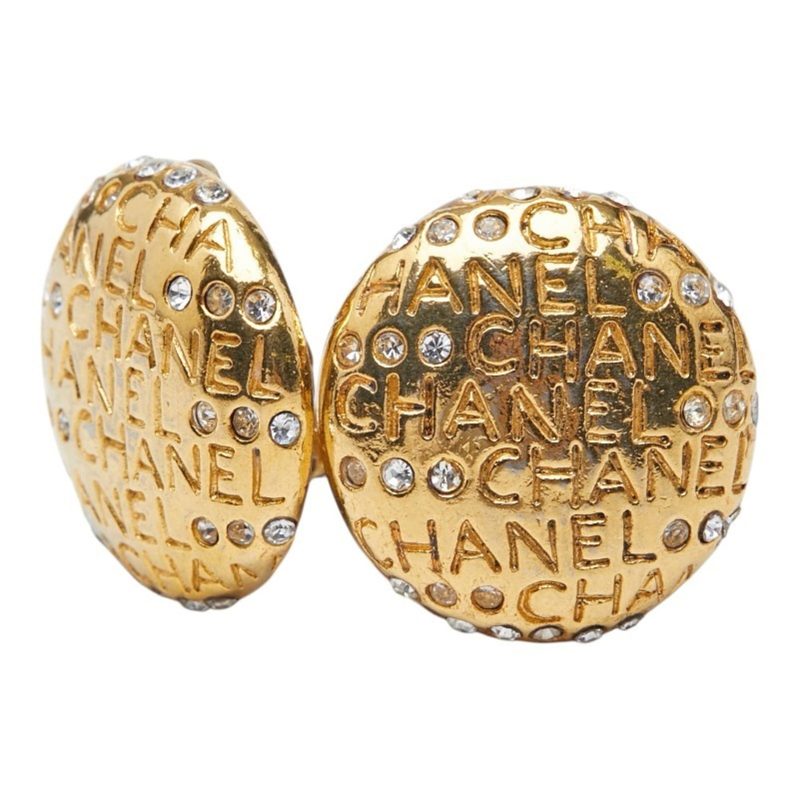 Earrings by Chanel: Earrings by Chanel Elegant gold clip earrings by Chanel, featuring a timeless design that adds a touch of sophistication to any outfit. With a few subtle signs of wear, these earrings retain their