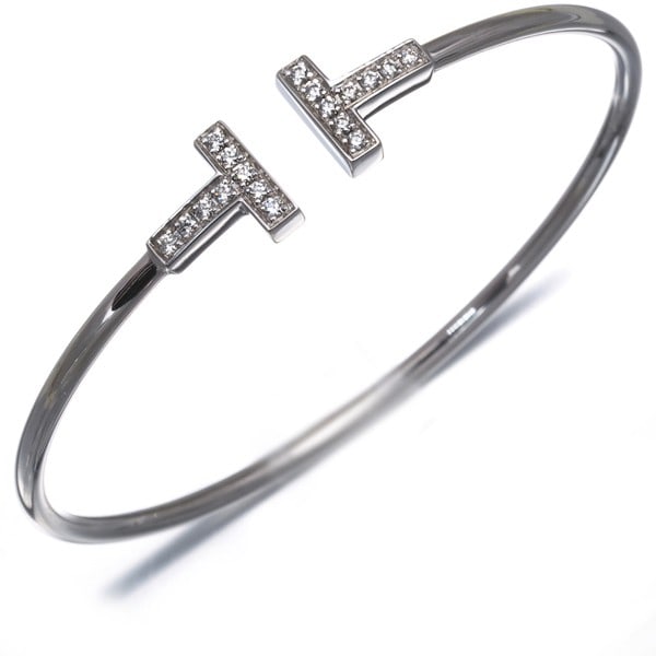 Tiffany&Co. Bracelet Diamond Tiffany T Wire Bangle 18K 750 White Gold: Tiffany&Co. Bracelet Diamond Tiffany T Wire Bangle 18K 750 White Gold A stunning 18k white gold Tiffany & Co. bracelet showcases a beautiful diamond set in the iconic Tiffany T wire bangle design,
