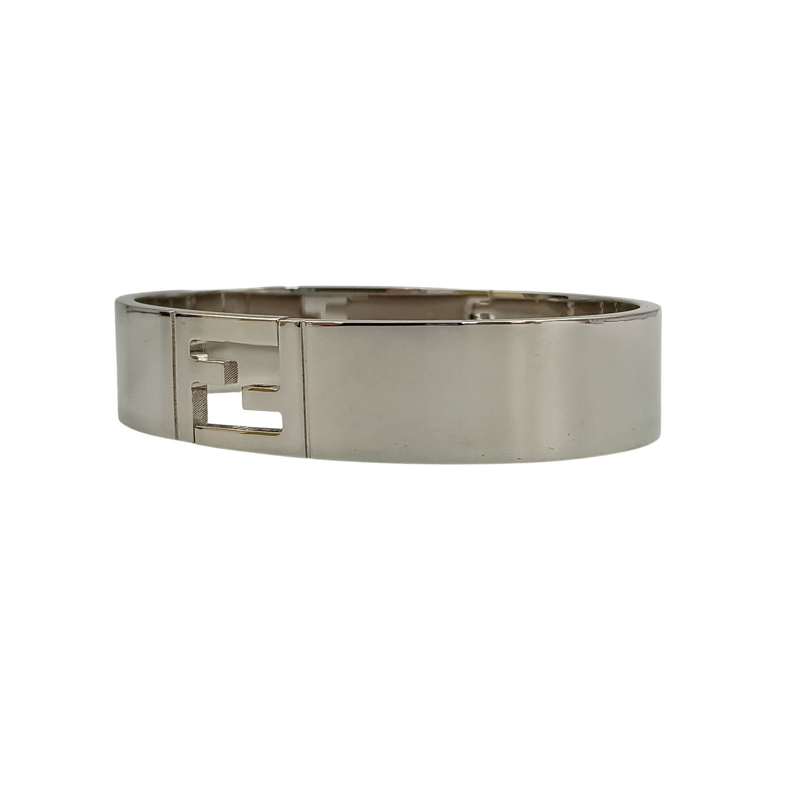 Fendi metal bangle: Fendi metal bangle A sleek and sophisticated silver Fendi metal bangle, this piece boasts a classic design that adds a touch of luxury to any outfit. Measuring 18cm in length and 1.5cm in width, it