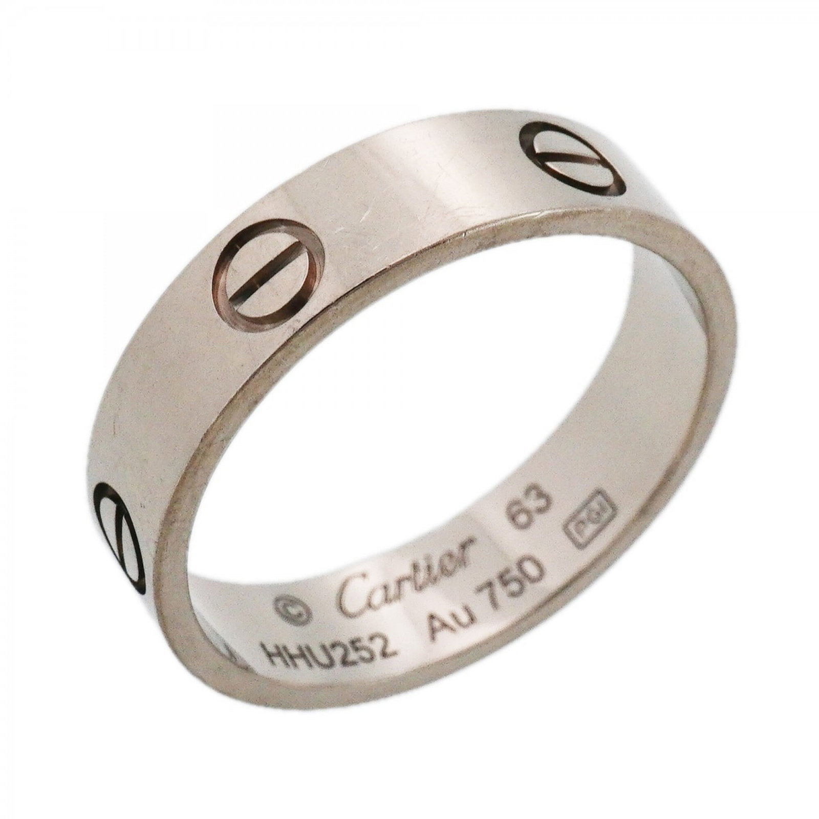 Cartier white gold ring band: Cartier white gold ring band A Cartier white gold ring band for men, crafted from 18K material, adds a touch of sophistication to any outfit. This pre-owned piece boasts a classic design with subtle