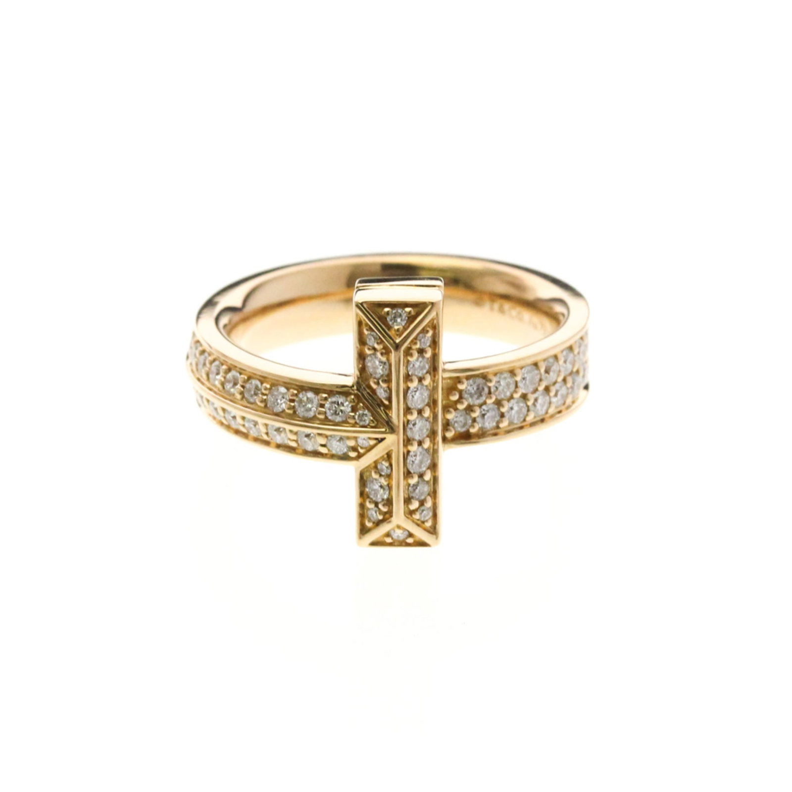 Pink gold 18k Tiffany band ring: Pink gold 18k Tiffany band ring Elevate your style with this stunning pink gold 18k Tiffany band ring, featuring a sleek and modern design that adds a touch of sophistication to any outfit. Crafted