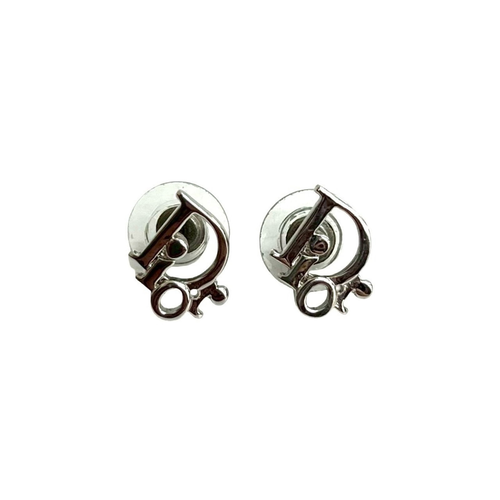 Christian Dior Stud Metal Earrings: Christian Dior Stud Metal Earrings Elegant silver stud earrings from Christian Dior, featuring a sleek and sophisticated design that adds a touch of luxury to any outfit. With their understated yet