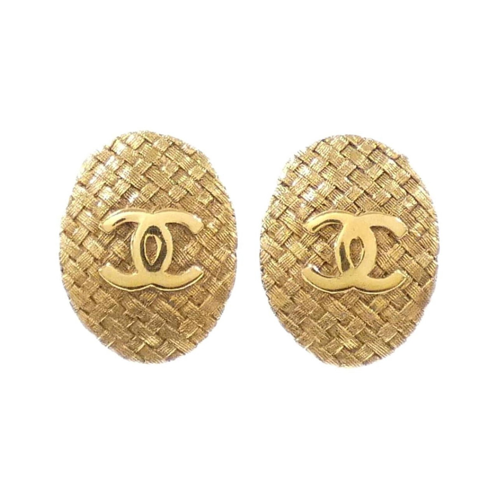 Earrings by Chanel: Earrings by Chanel Elegant gold clip earrings from Chanel, featuring a timeless design that adds a touch of sophistication to any outfit. With a few subtle signs of wear, these earrings still shine wi