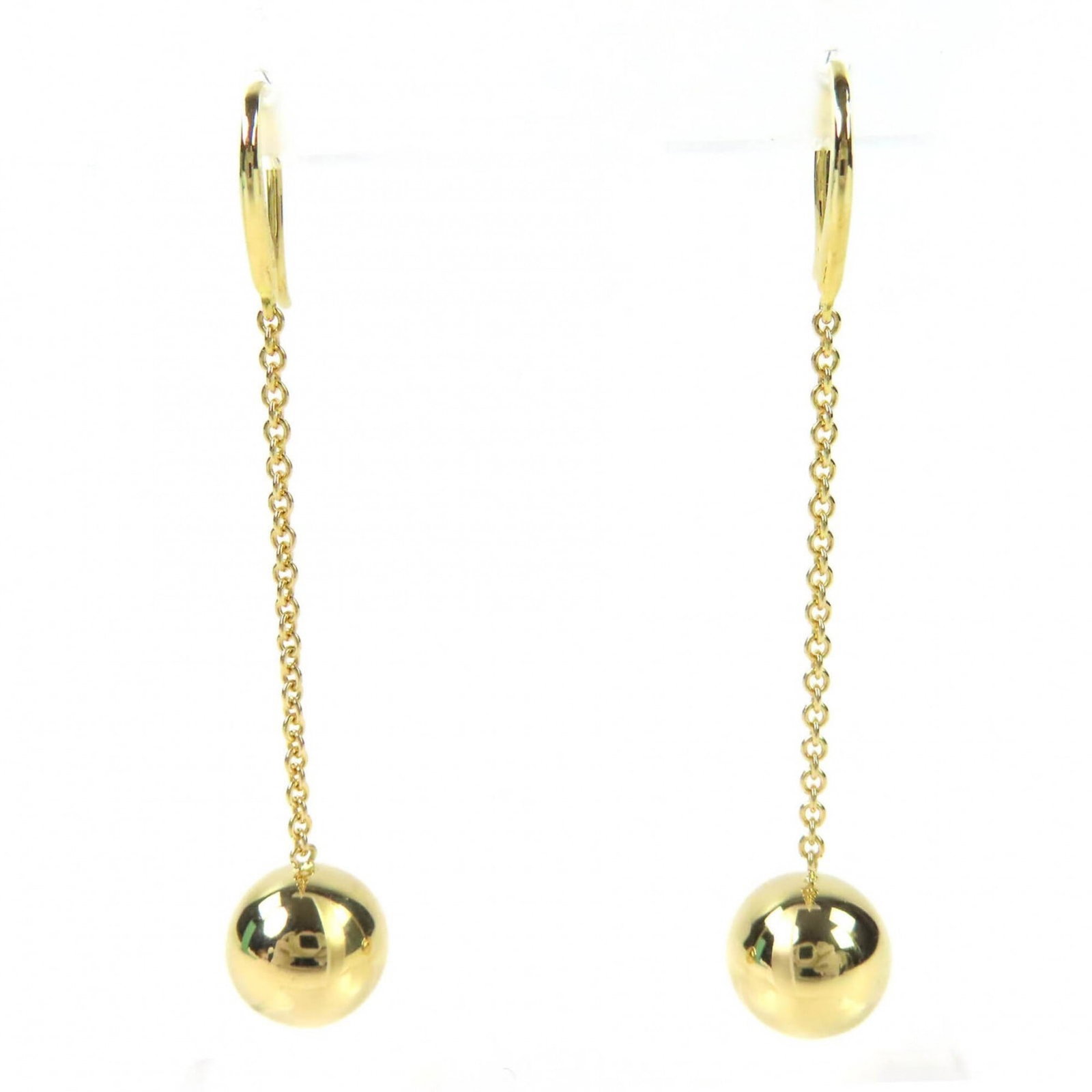 Tiffany Drop Gold 18K Earrings: Tiffany Drop Gold 18K Earrings Elevate your style with these stunning 18K gold drop earrings from Tiffany. With their sleek design and luxurious gold finish, they add a touch of sophistication to any 