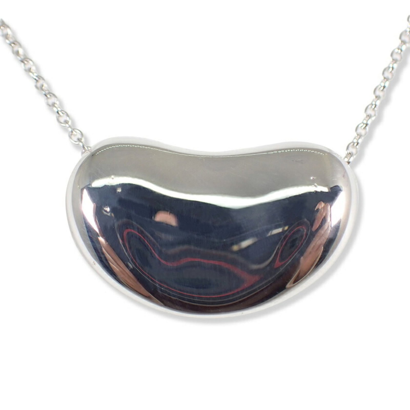 Tiffany and Co. 925 bean necklace pendant: Tiffany and Co. 925 bean necklace pendant A stunning sterling silver pendant from Tiffany and Co., this 925 bean necklace boasts elegant design with intricate details. Measuring 12mm x 19mm, the