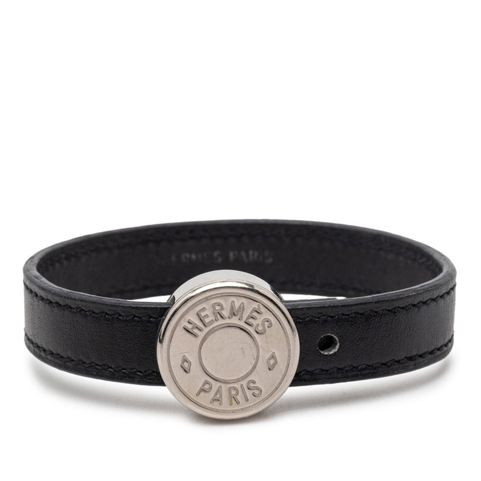 Hermes Leather Metal Charm Bracelet: Hermes Leather Metal Charm Bracelet A sleek and sophisticated charm bracelet from Hermes, crafted with high-quality leather and metal details in black, orange, and silver hues. With its classic