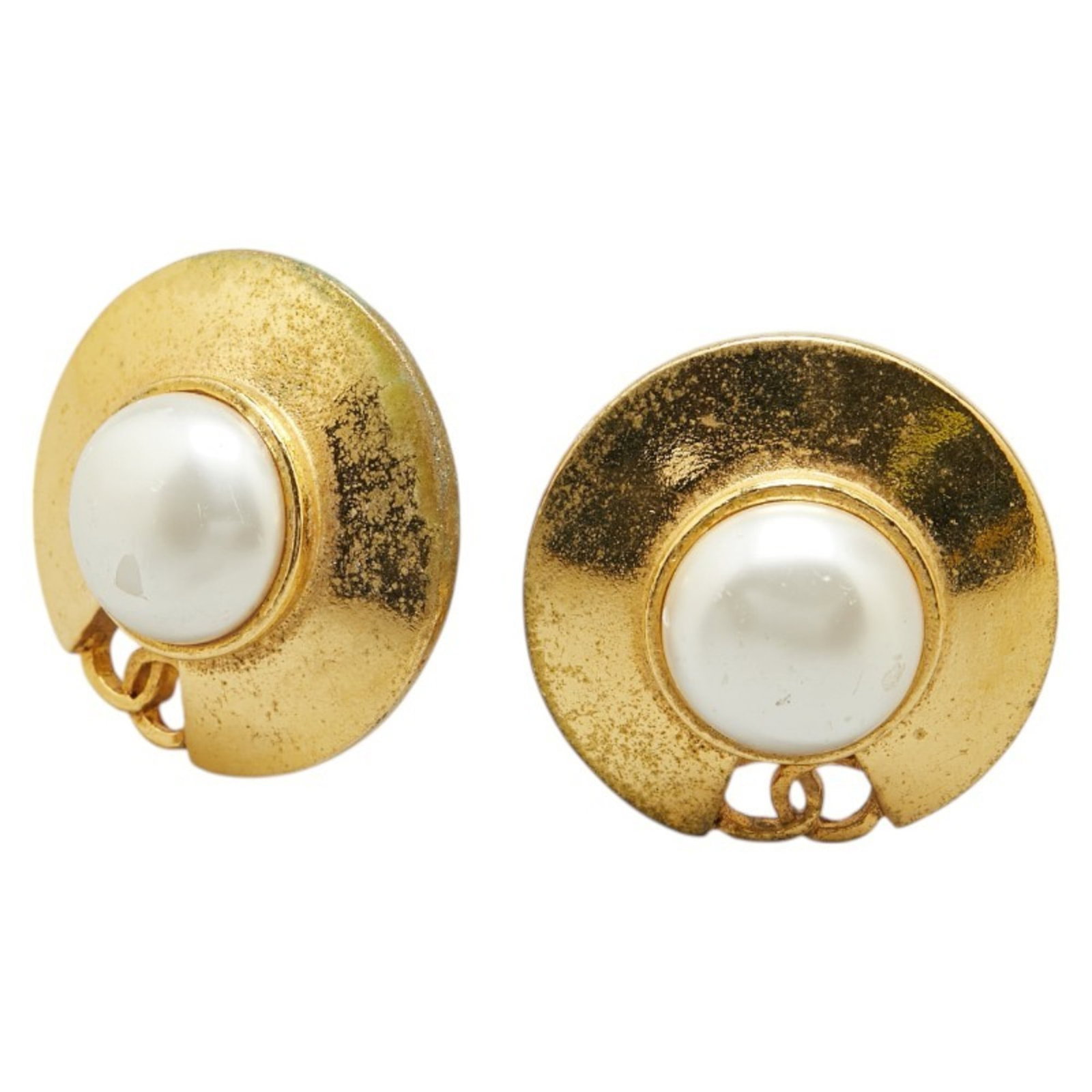 Earrings by Chanel: Earrings by Chanel Elegant gold clip earrings from Chanel, featuring a timeless design with subtle signs of wear. With a 1.37'' square shape and a gentle patina, these earrings showcase the subtle