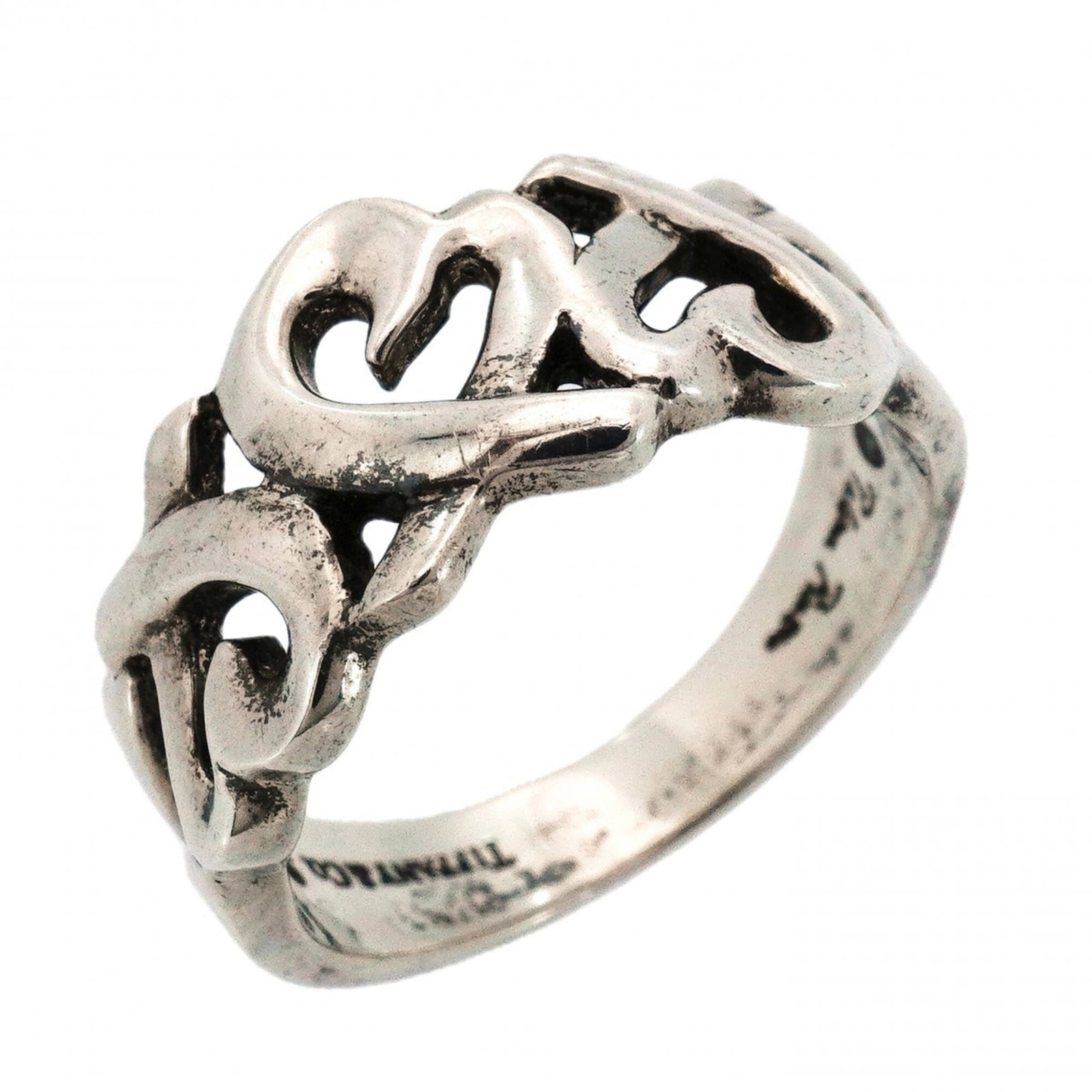 Tiffany silver ring band.: Tiffany silver ring band. A 925 sterling silver Tiffany ring band with a classic design, this used piece showcases subtle signs of wear and minor imperfections that add to its unique character. Made