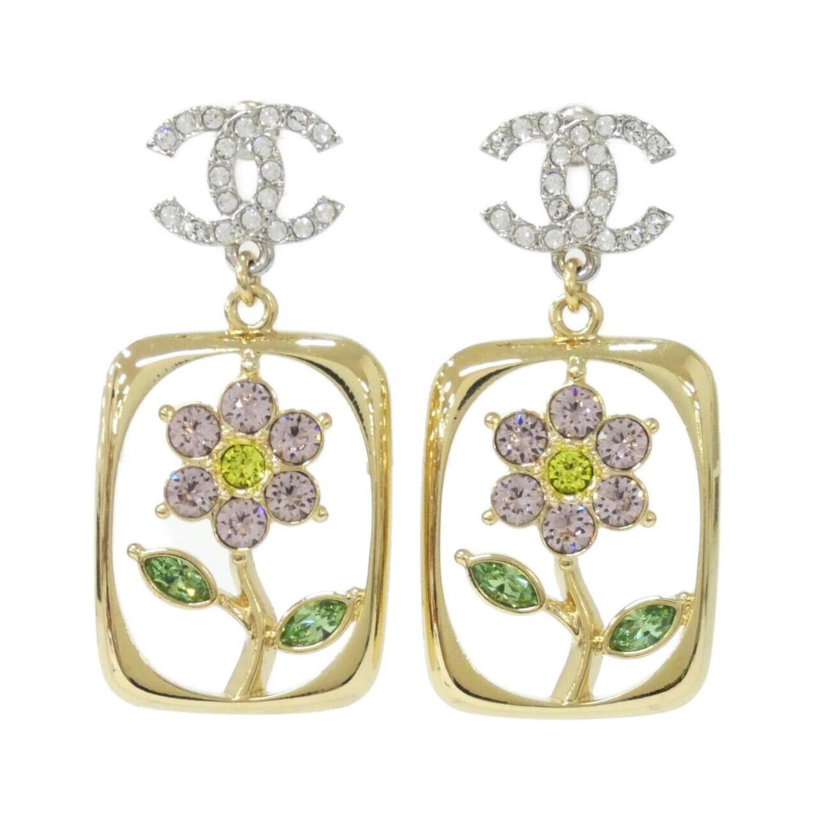 Chanel drop earrings: Chanel drop earrings Elegant Chanel drop earrings with a touch of whimsy, featuring crystal stones in a vibrant green and pink hue. Made from high-quality materials, these earrings showcase a subtle
