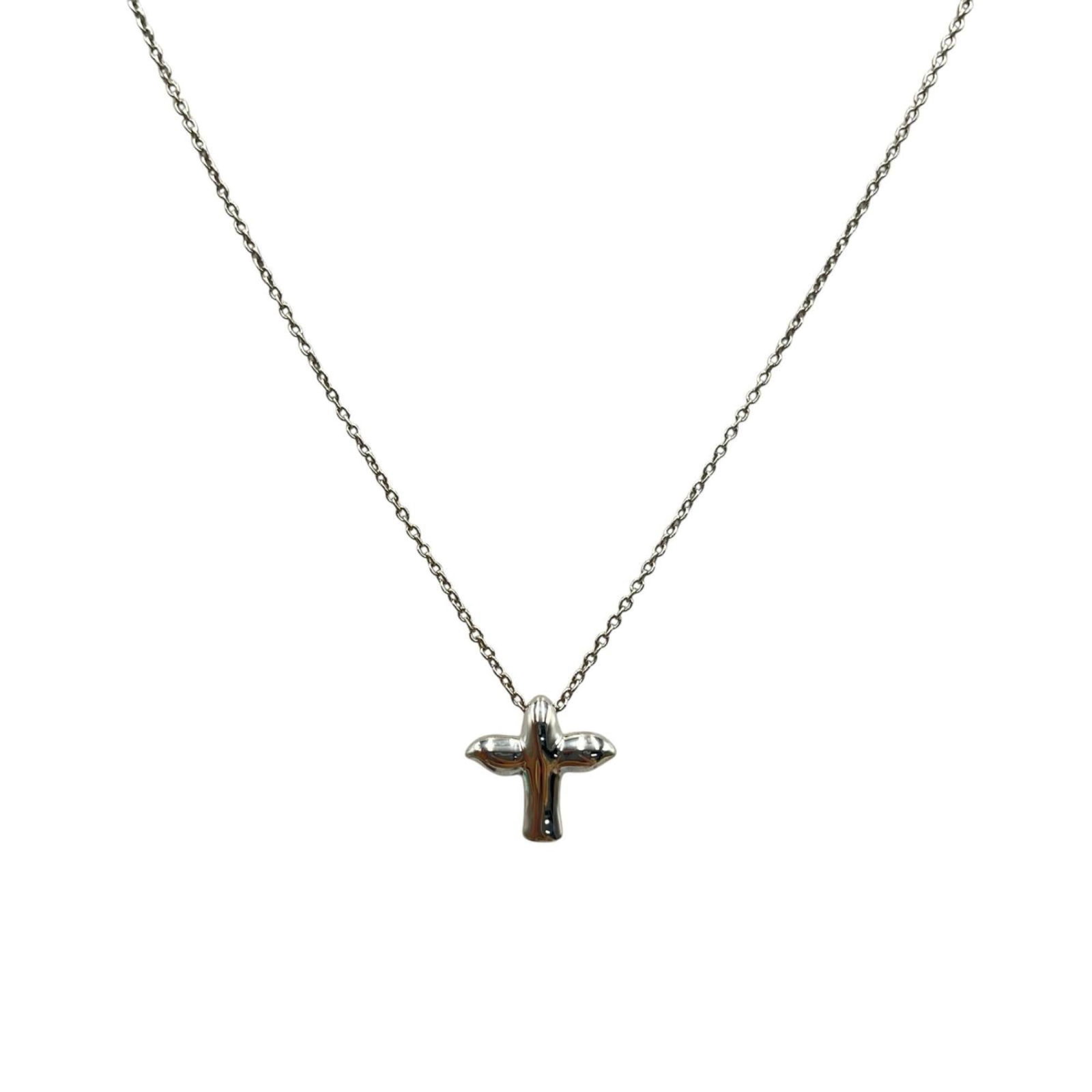 Tiffany & Co. Elsa Peretti Bird Cross Necklace in 925 Sterling Silver for Women: Tiffany & Co. Elsa Peretti Bird Cross Necklace in 925 Sterling Silver for Women A delicate 925 sterling silver necklace from Tiffany & Co., featuring the iconic Elsa Peretti Bird Cross design. This