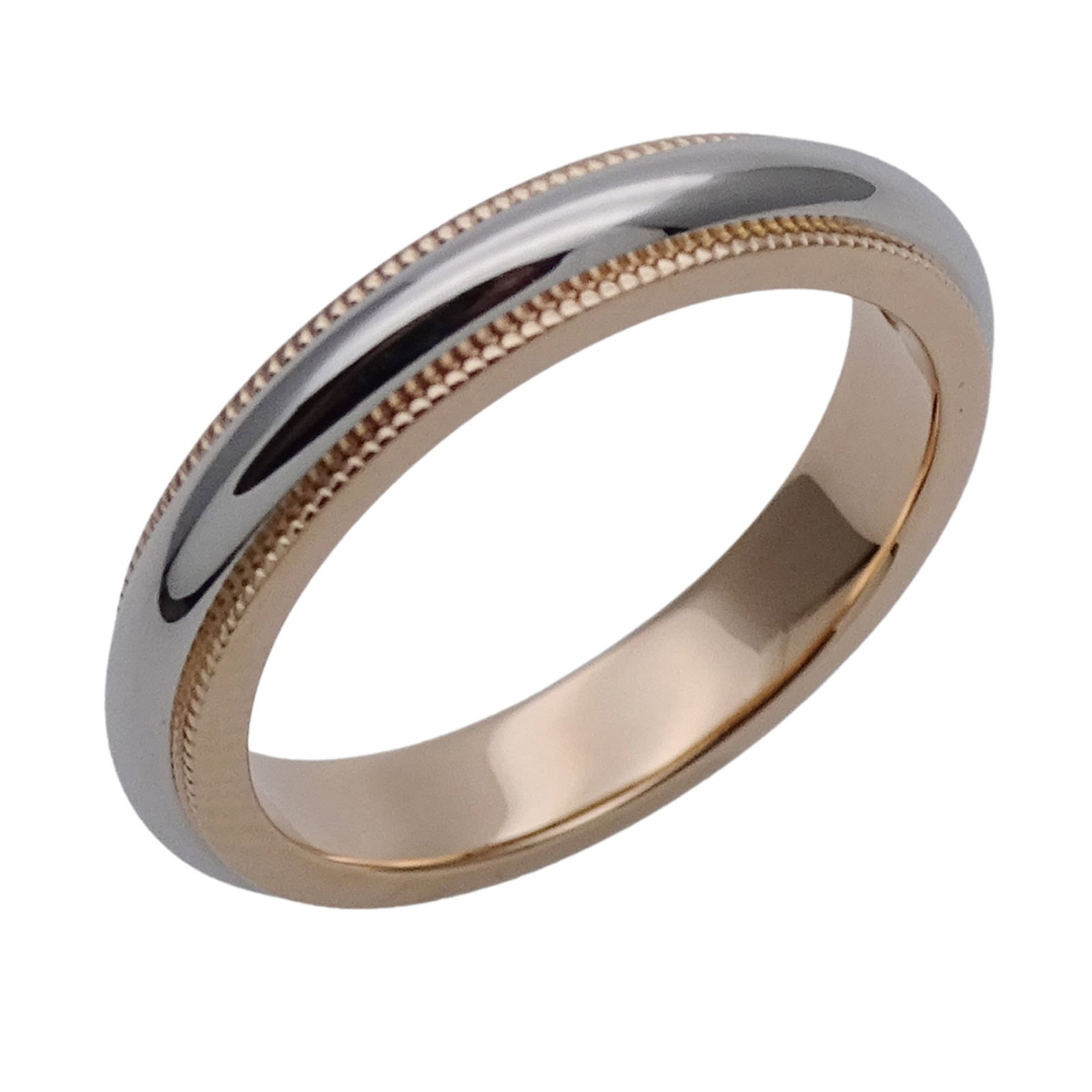 Tiffany Band Ring Pink Gold (18K), Platinum 950: Tiffany Band Ring Pink Gold (18K), Platinum 950 A beautiful Tiffany band ring in pink gold (18K) and platinum 950, this elegant piece is crafted with high-quality materials for a timeless look. With