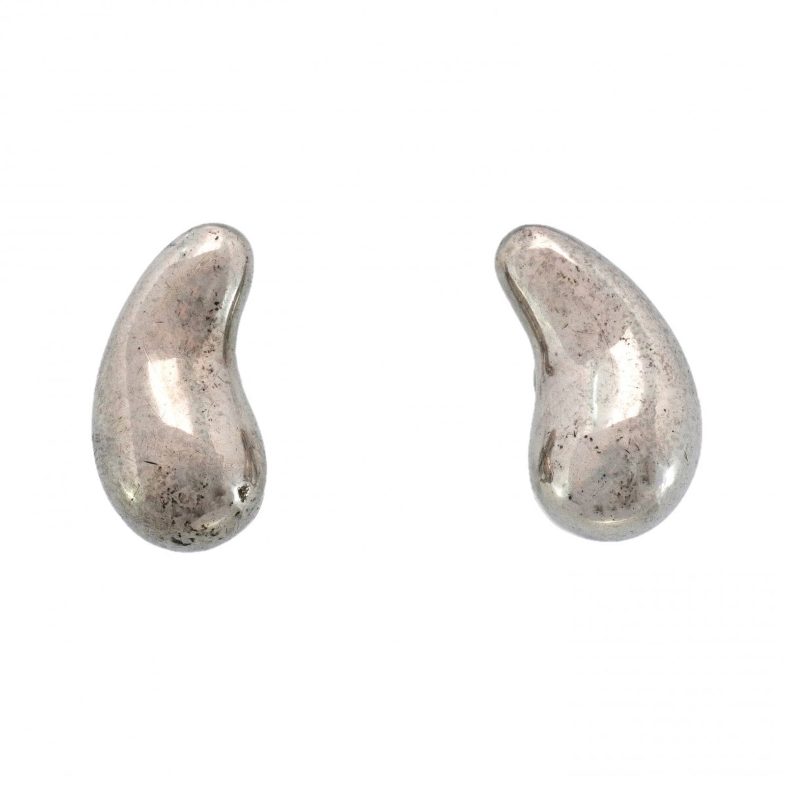 Tiffany silver clip earrings 925.: Tiffany silver clip earrings 925. Elegant Tiffany silver clip earrings with a subtle shine, featuring 925 sterling silver construction. With their compact size and sleek design, these earrings are