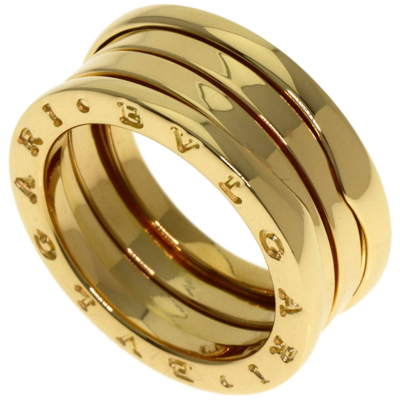 Bvlgari gold yellow band ring: Bvlgari gold yellow band ring A 18K yellow gold Bvlgari band ring with a touch of elegance, this piece boasts a subtle shine from its high-karat gold content. With some minor signs of wear, it still