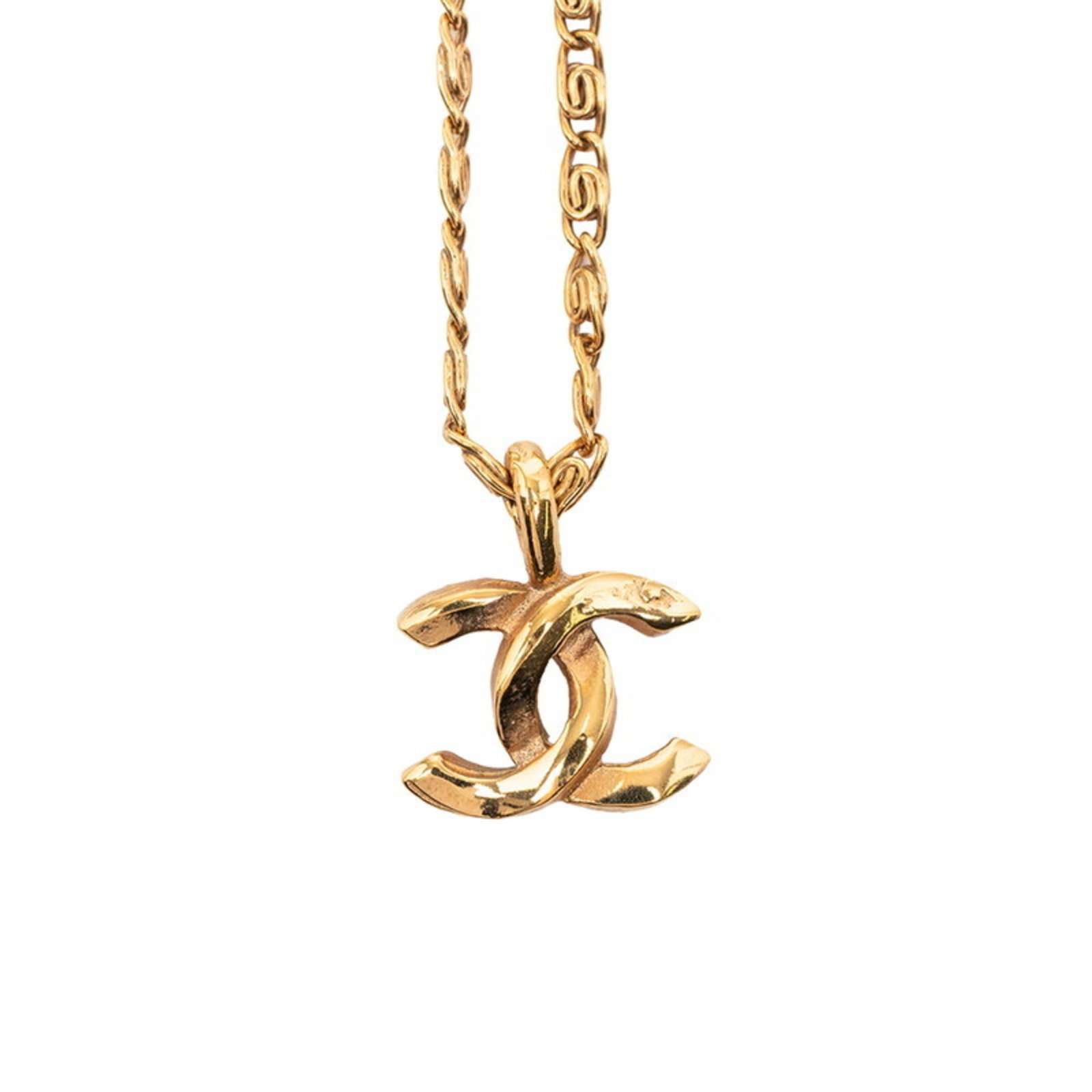 Chanel Women's Gold Plated Coco Mark Necklace: Chanel Women's Gold Plated Coco Mark Necklace A beautiful Chanel gold plated Coco Mark necklace, featuring a 14.4mm x 11.7mm pendant, is up for auction. This elegant piece boasts a classic design