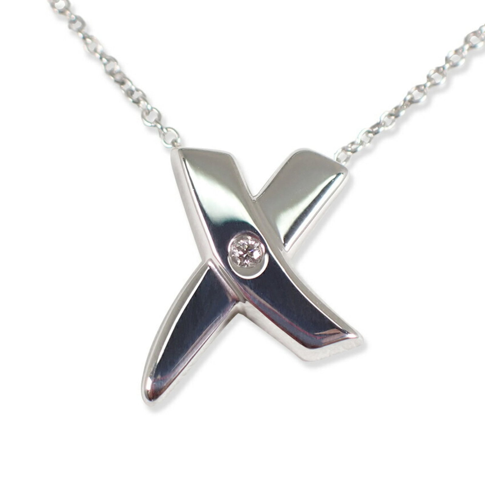 Tiffany 925 Kiss Diamond necklace by Paloma Picasso: Tiffany 925 Kiss Diamond necklace by Paloma Picasso A stunning Tiffany 925 Kiss Diamond necklace by Paloma Picasso, this sterling silver pendant showcases a beautiful diamond set within its elegant