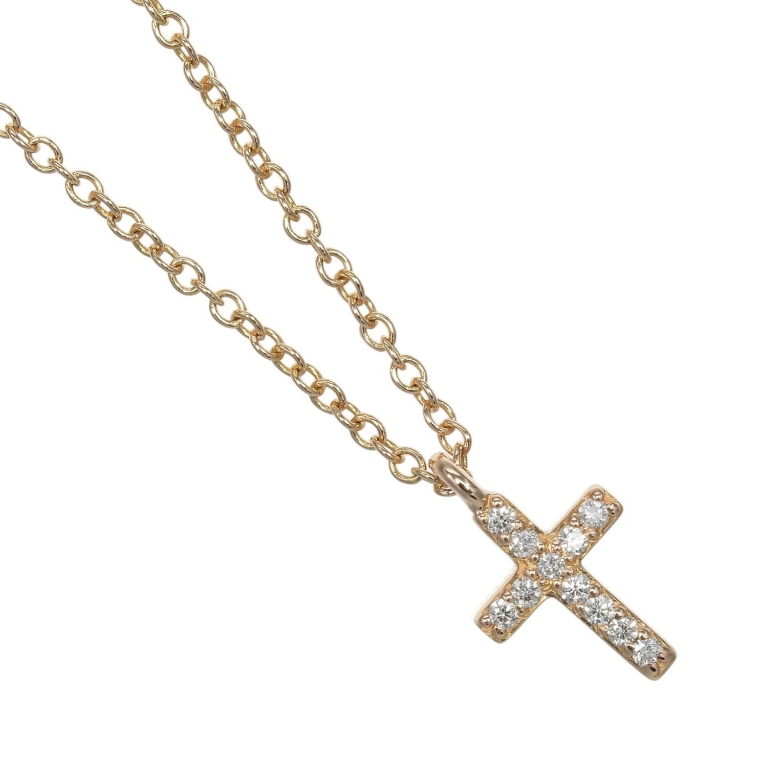 Tiffany & Co. Metro Cross Mini Necklace, 18K Pink Gold with Diamonds, Approx. 1.75g.: Tiffany & Co. Metro Cross Mini Necklace, 18K Pink Gold with Diamonds, Approx. 1.75g. Elegant and understated, this 18K pink gold Tiffany & Co. Metro Cross Mini Necklace boasts a delicate design featur