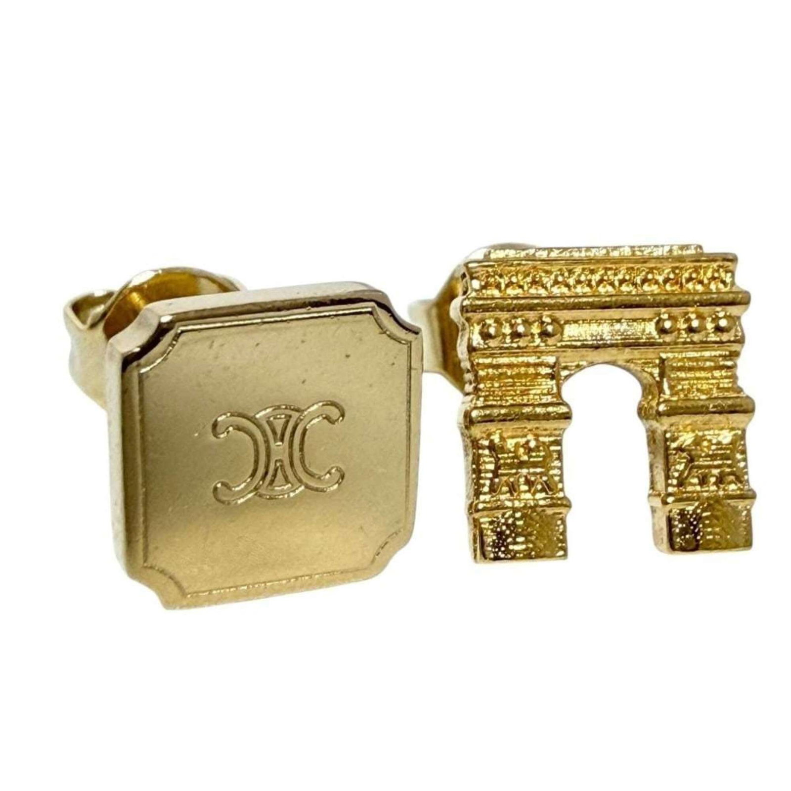 Metal stud earrings from Celine.: Metal stud earrings from Celine. Unique Celine metal stud earrings with a few subtle signs of wear, adding to their understated charm. The earrings retain their original condition, with only minor