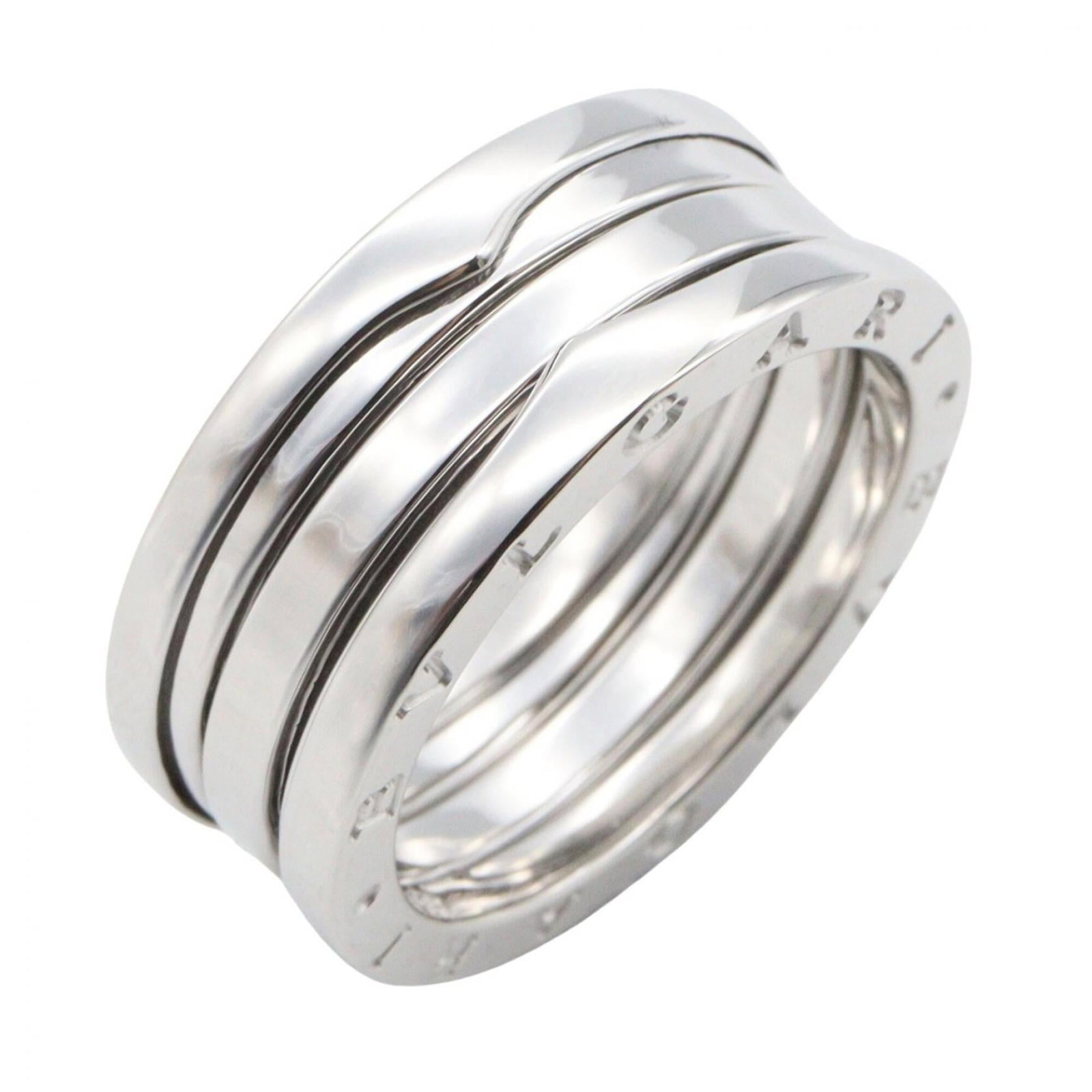 Bvlgari Band Ring White Gold (18K): Bvlgari Band Ring White Gold (18K) A sleek Bvlgari band ring in white gold (18K) adds a touch of sophistication to any outfit, its silver hue complementing a range of styles. With a few subtle signs o