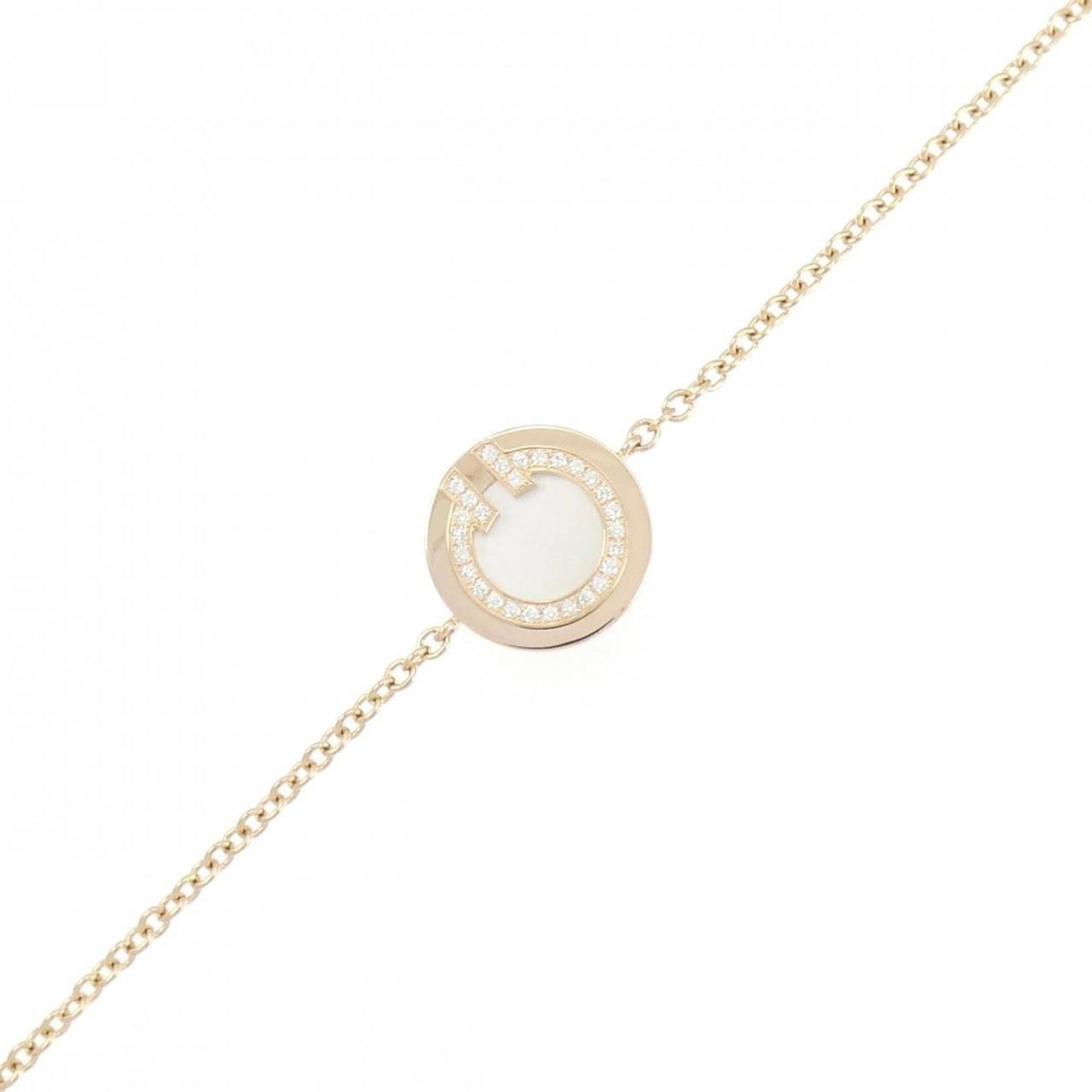 Pink Gold 18K Tiffany Charm Bracelet: Pink Gold 18K Tiffany Charm Bracelet Elegant and sophisticated, this 18K pink gold Tiffany charm bracelet boasts a delicate design featuring a diamond and mother of pearl stone. Measuring approximatel