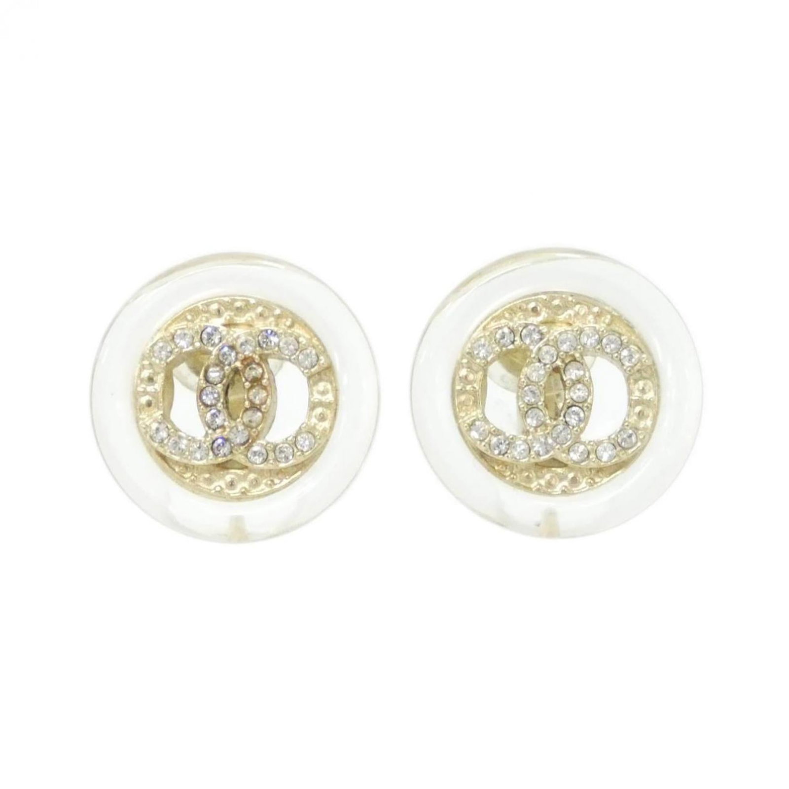 Earrings by Chanel: Earrings by Chanel Elegant clip earrings from Chanel, featuring a clear and gold design that adds a touch of sophistication to any outfit. With a size of 18.00mm x 18.00mm, these earrings showcase