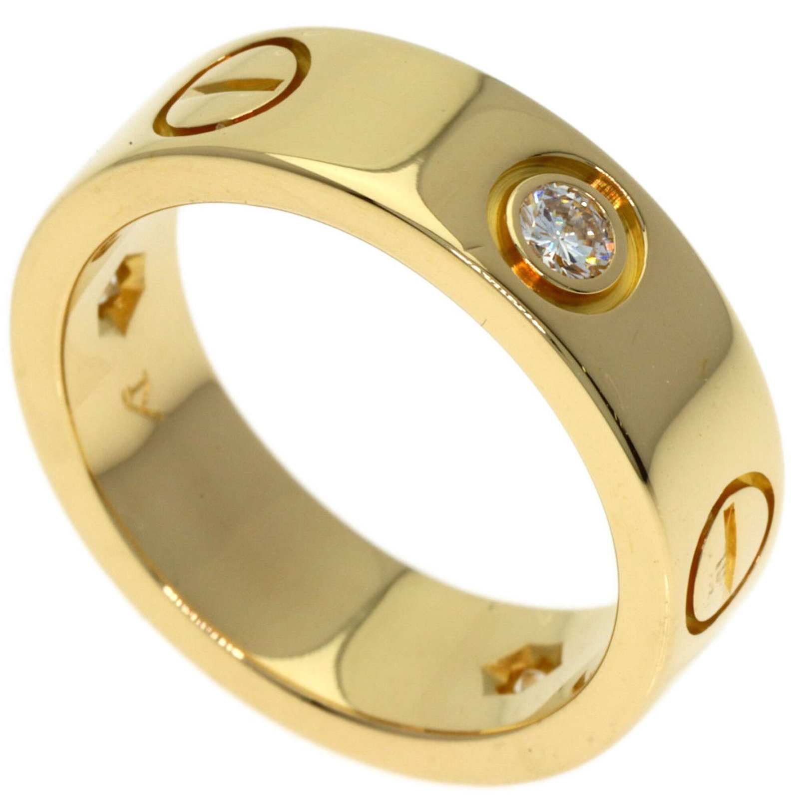 Cartier gold yellow ring band: Cartier gold yellow ring band A 18K yellow gold Cartier band ring with a diamond stone, this piece boasts a classic design that exudes elegance and sophistication. With some minor scratches and wear