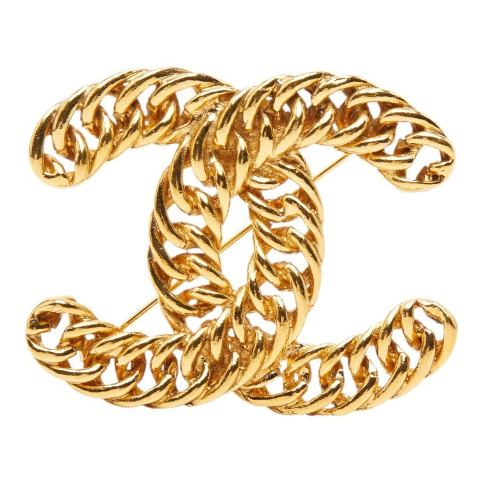 Chanel is a brooch: Chanel is a brooch A gold Chanel brooch with a classic design, this piece boasts a timeless elegance that adds a touch of sophistication to any outfit. Measuring 5.3cm x 6.63cm, it features subtle
