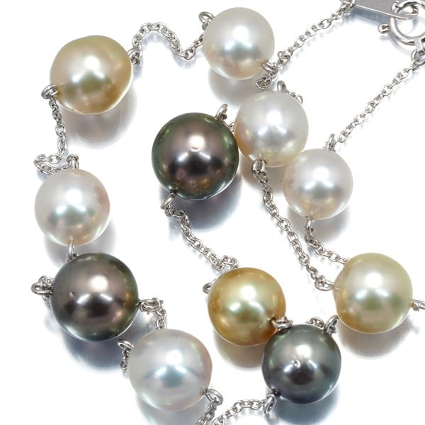 White Gold 18K Station 8.3-10.3Mm Golden Pearl Necklace: White Gold 18K Station 8.3-10.3Mm Golden Pearl Necklace A stunning 18k white gold station necklace showcases a beautiful South Sea pearl with a lustrous golden hue, set in Japan-made TASAKI jewelry.