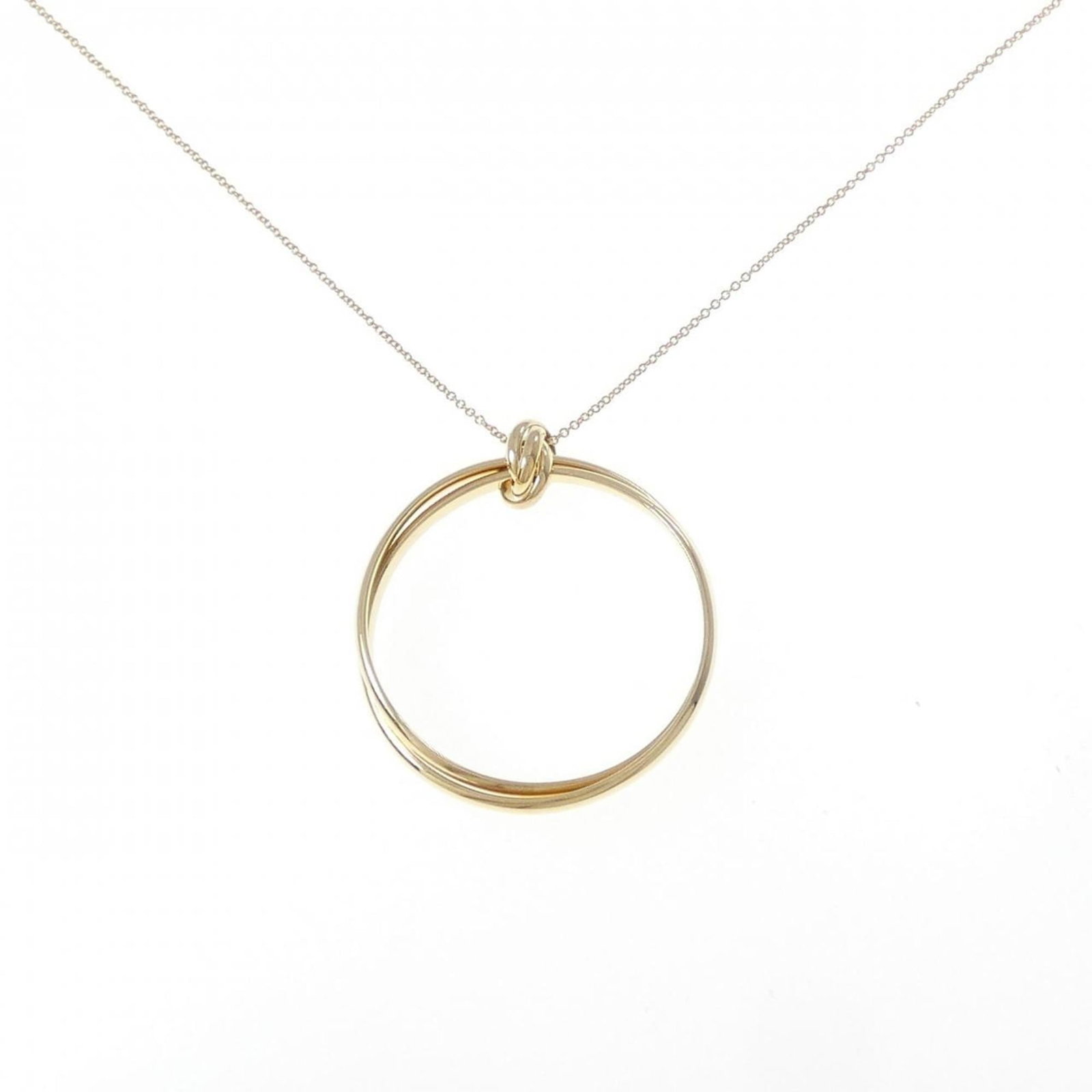 Tiffany Circle Large Melody Necklace: Tiffany Circle Large Melody Necklace A stunning Tiffany Circle Large Melody Necklace in 18K yellow gold, featuring a 42.7mm x 37.7mm pendant with a subtle width of 1.2mm. This elegant necklace boasts
